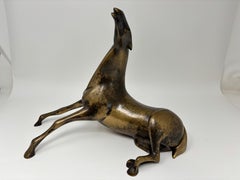 Sculpture en bronze représentant un cheval couché, de Loet Vanderveen, signée et numérotée, édition limitée