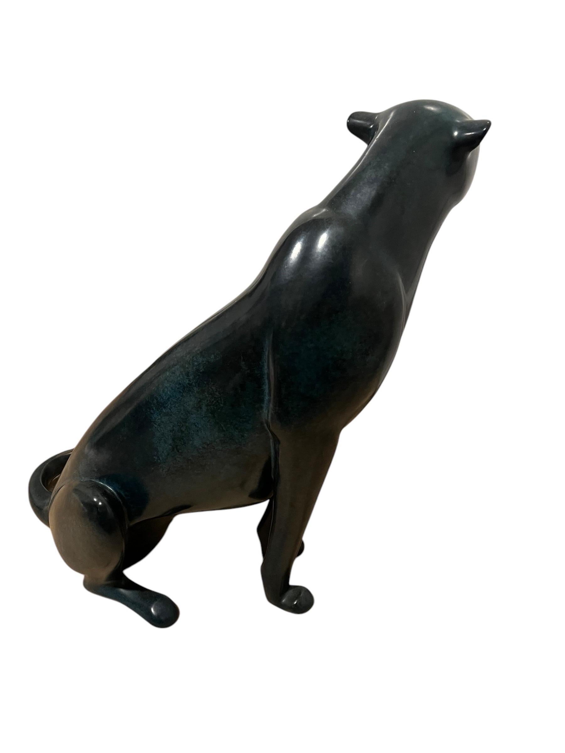 Large limited edition (44/500) Seated Cheetah bronze sculpture by Loet Vanderveen.  Dimensions are  19 1/2