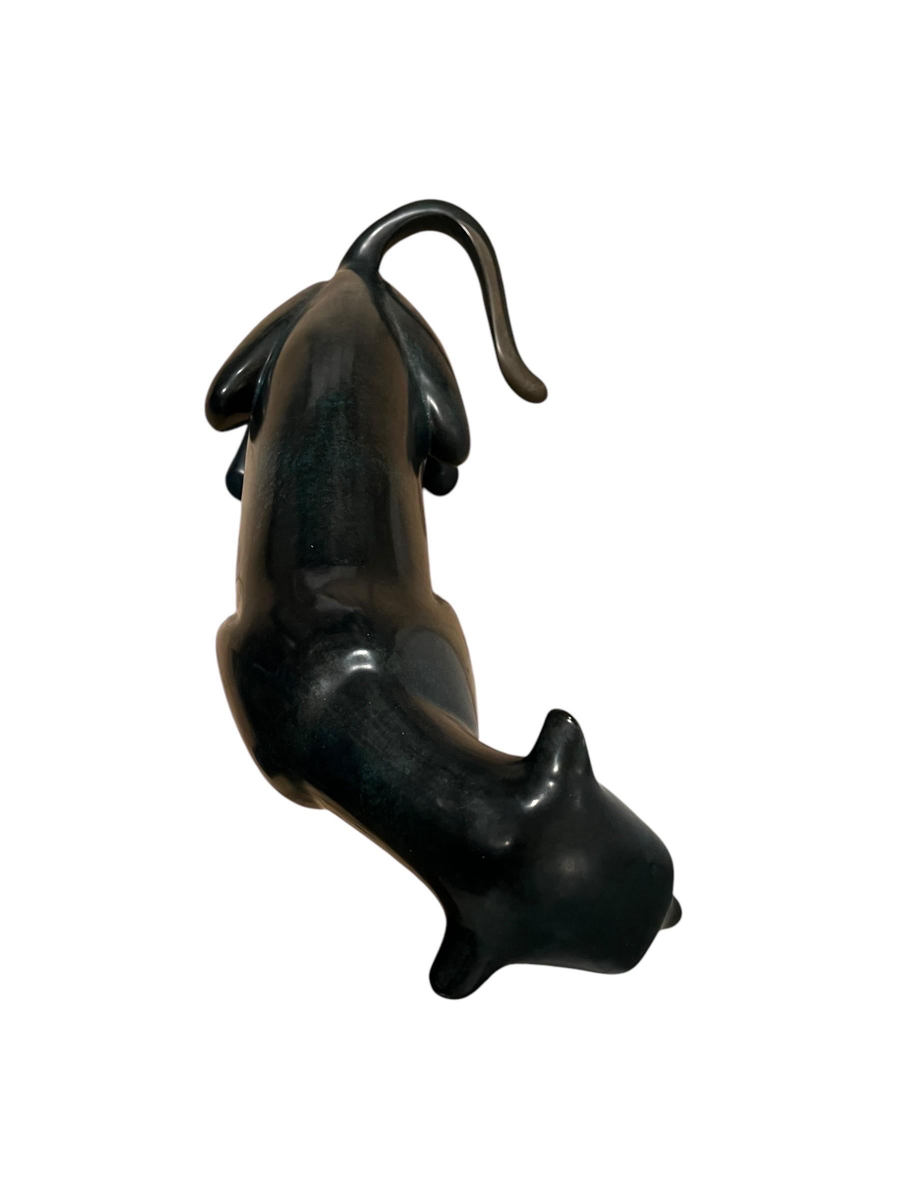 Cast Loet Vanderveen large seated cheetah bronze sculpture For Sale