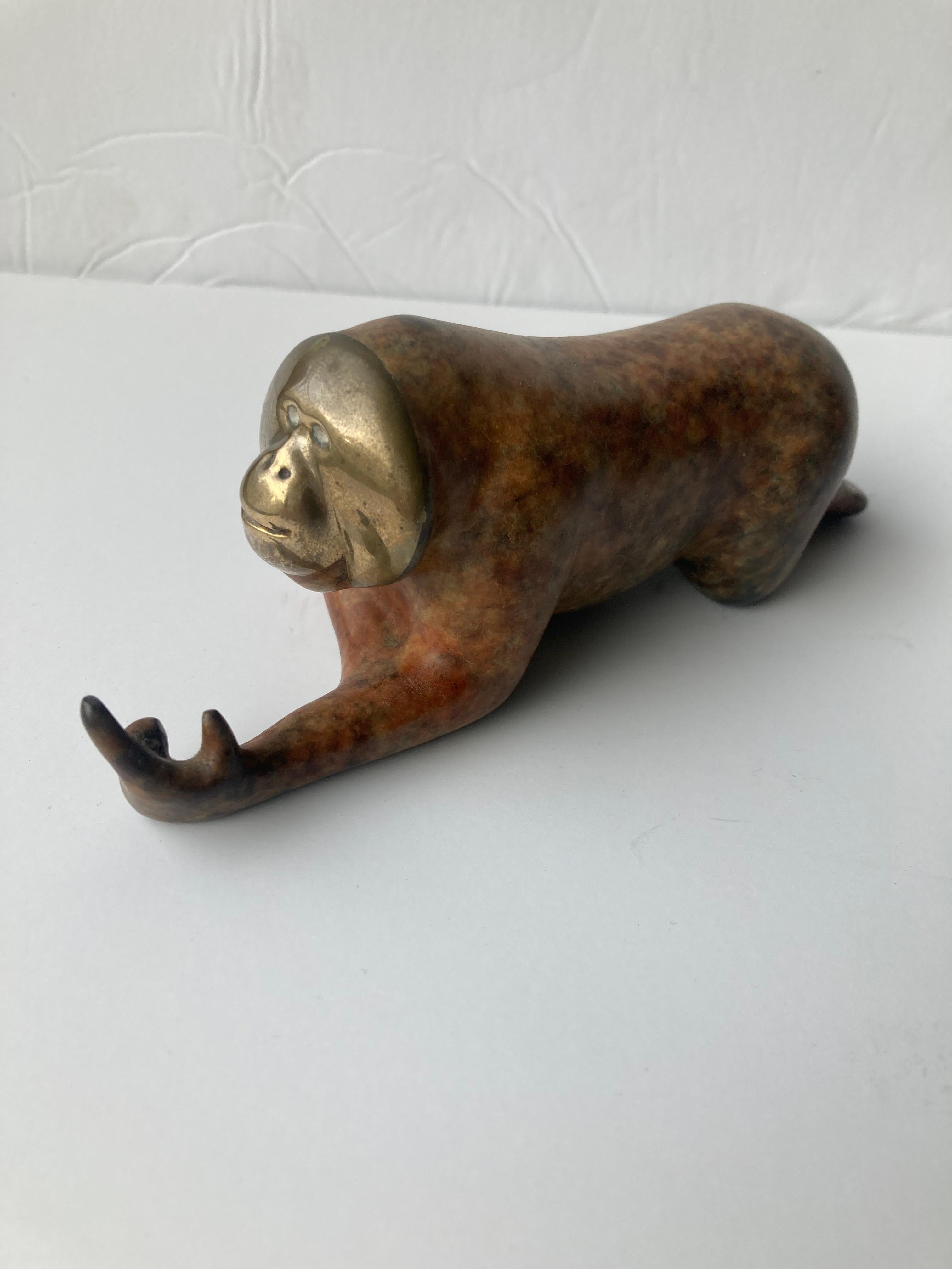 Loet Vanderveen was born in Holland and worked in fashion and later living in New York, London ,Zurich worked in the Zoo sculptures using great patinas. This orangutan is signed and numbered 304/2500.