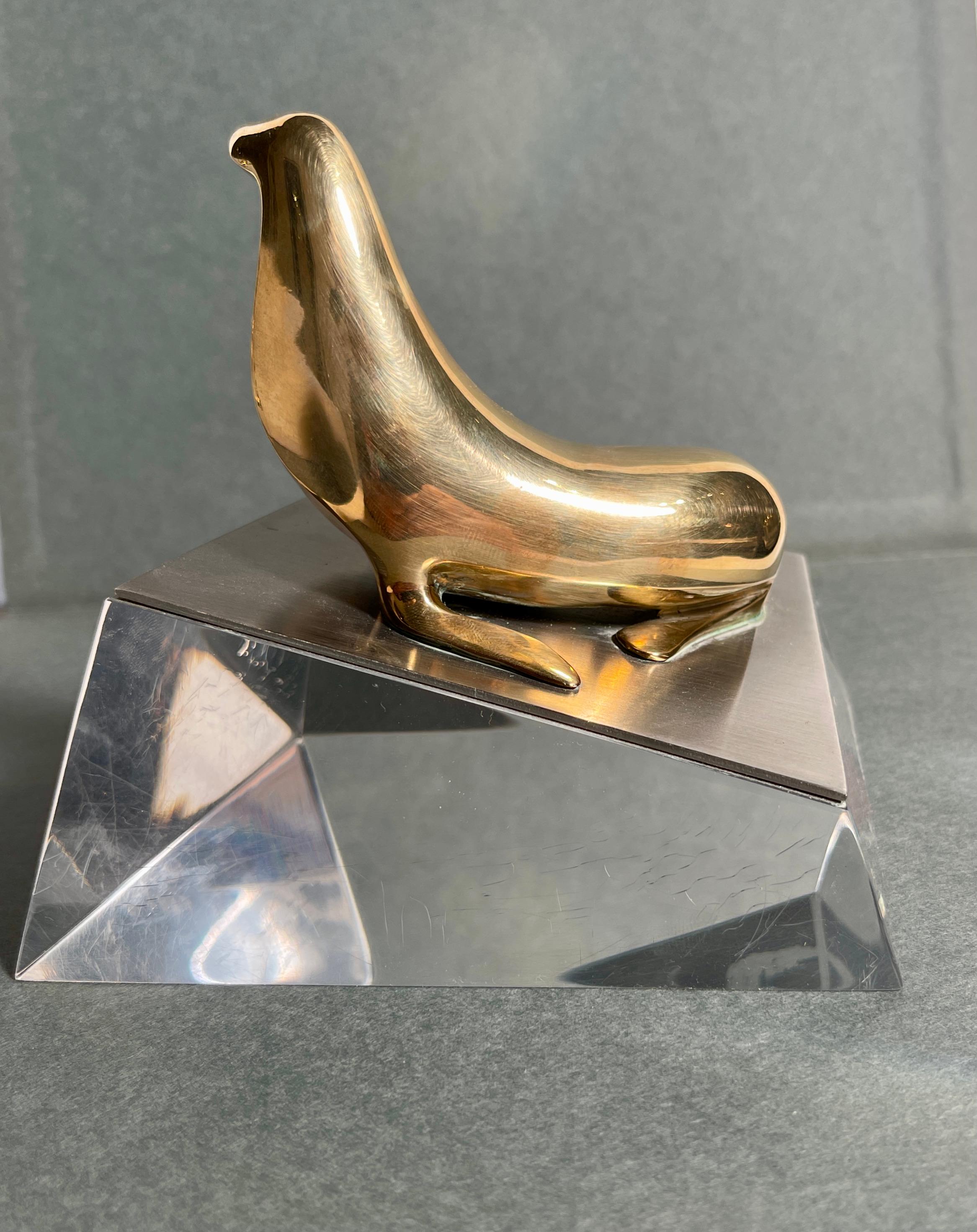 Loet Vanderveen Bronze Seal Sculpture on lucite. Signed and numbered. Edition 60/500.