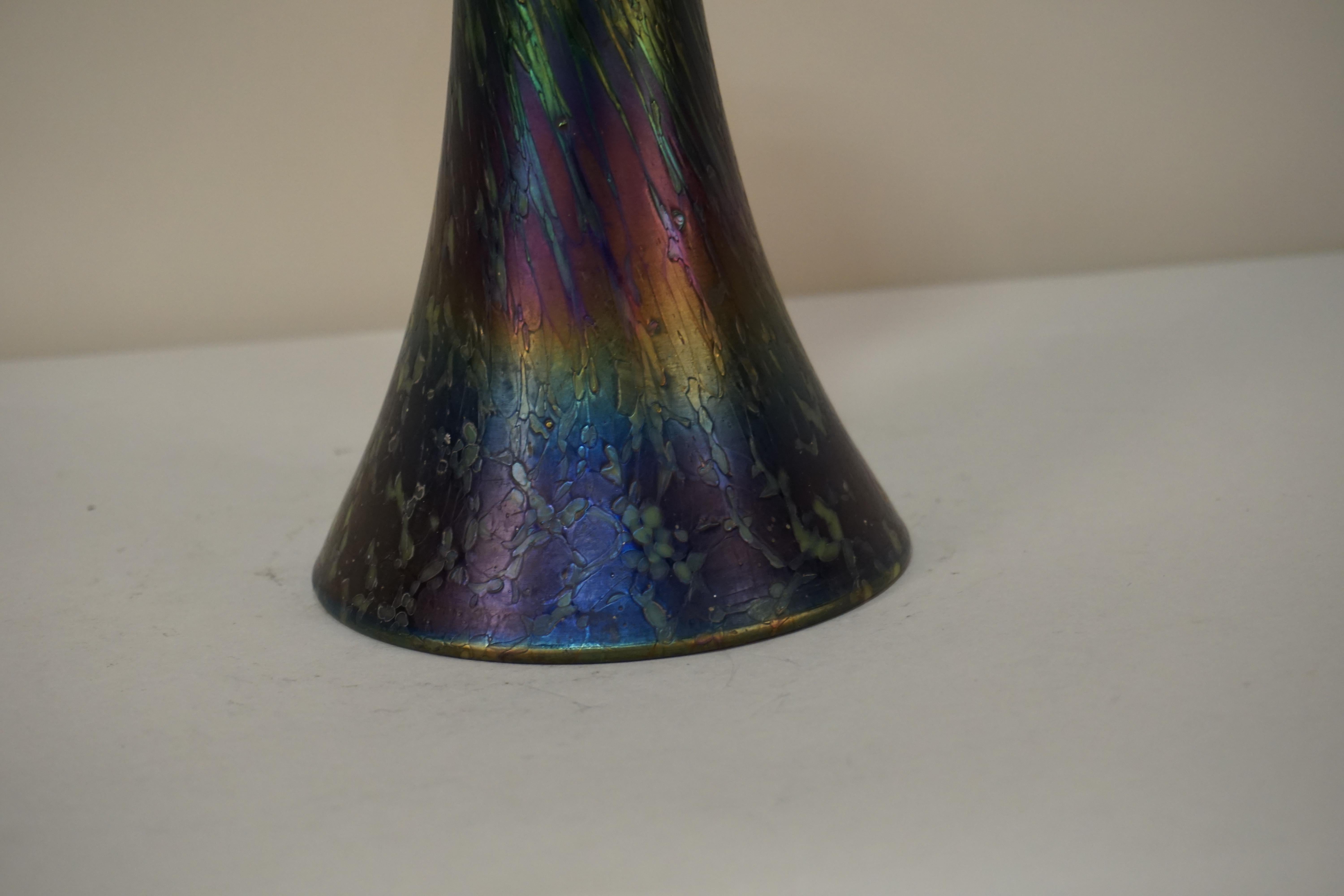 Beautiful art glass vase with iridescent glaze.