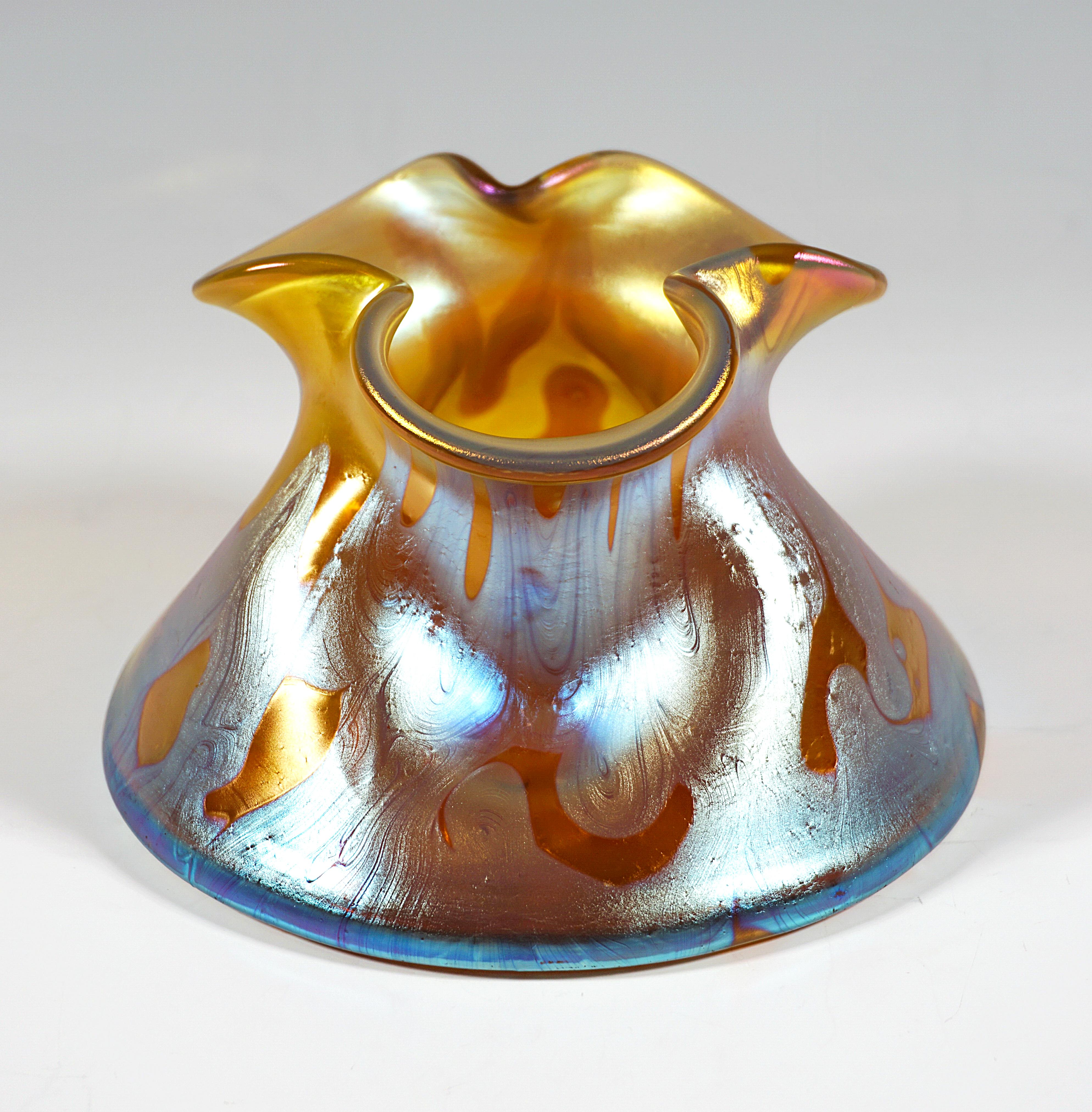 Finest Bohemian Art Nouveau Glass Vase:
In shape blown low, cambered body on a large, round floor plan, triple indented wall with a mouth rim formed into a three-pass shape, polished pontil, with ground signature 'Loetz Austria'.

Shape: Series II,