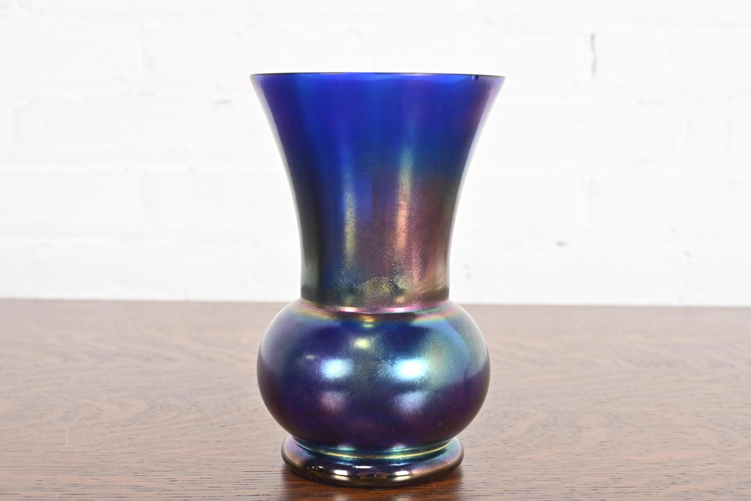 A gorgeous Art Nouveau period iridescent art glass vase 

By Loetz

Austria, Early 20th Century

Measures: 5
