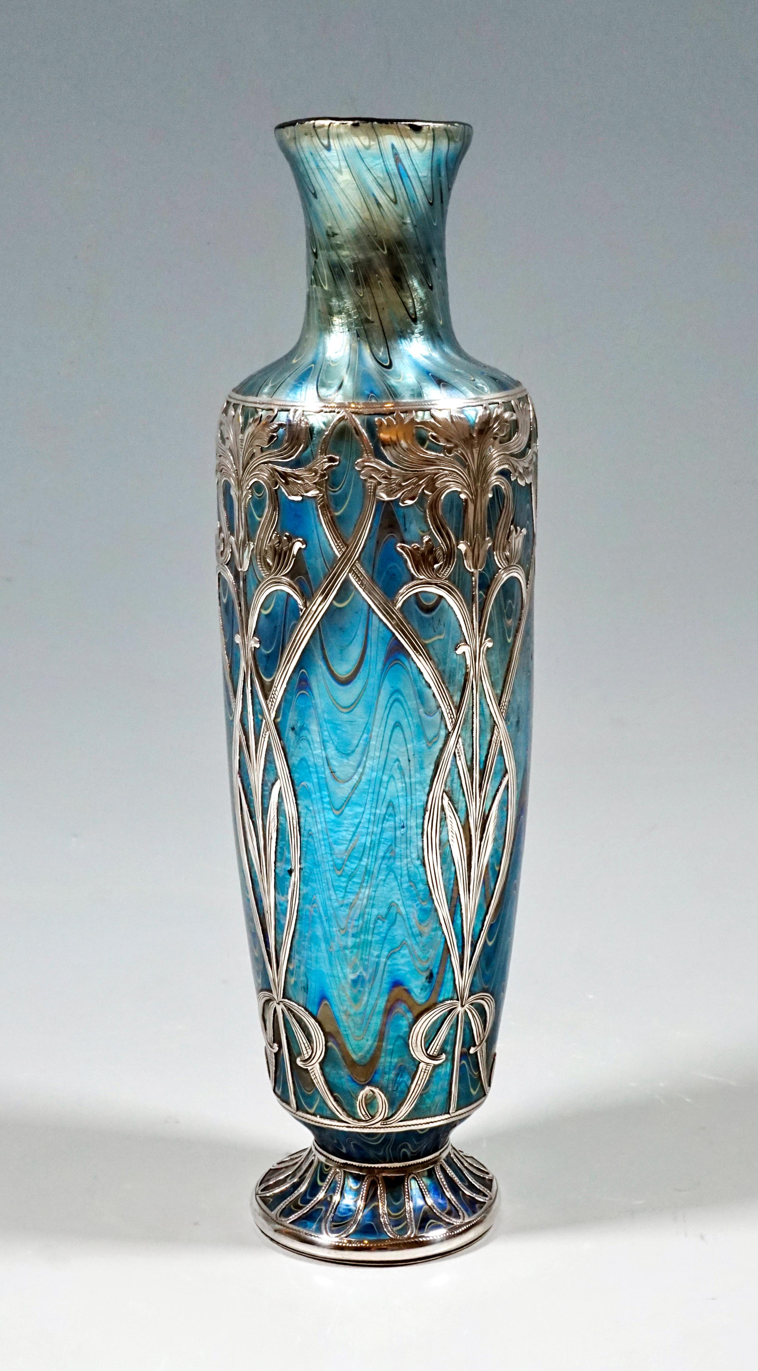 Finest Bohemian Art Nouveau glass vase
Blown into the form of a baluster-shaped body with an offset neck and a flared mouth rim, based on a round, offset base.

Shape: Series I, Prod. nr. - PN 7968, year 1899

Decor: Phenomenon Genre - PG 6893