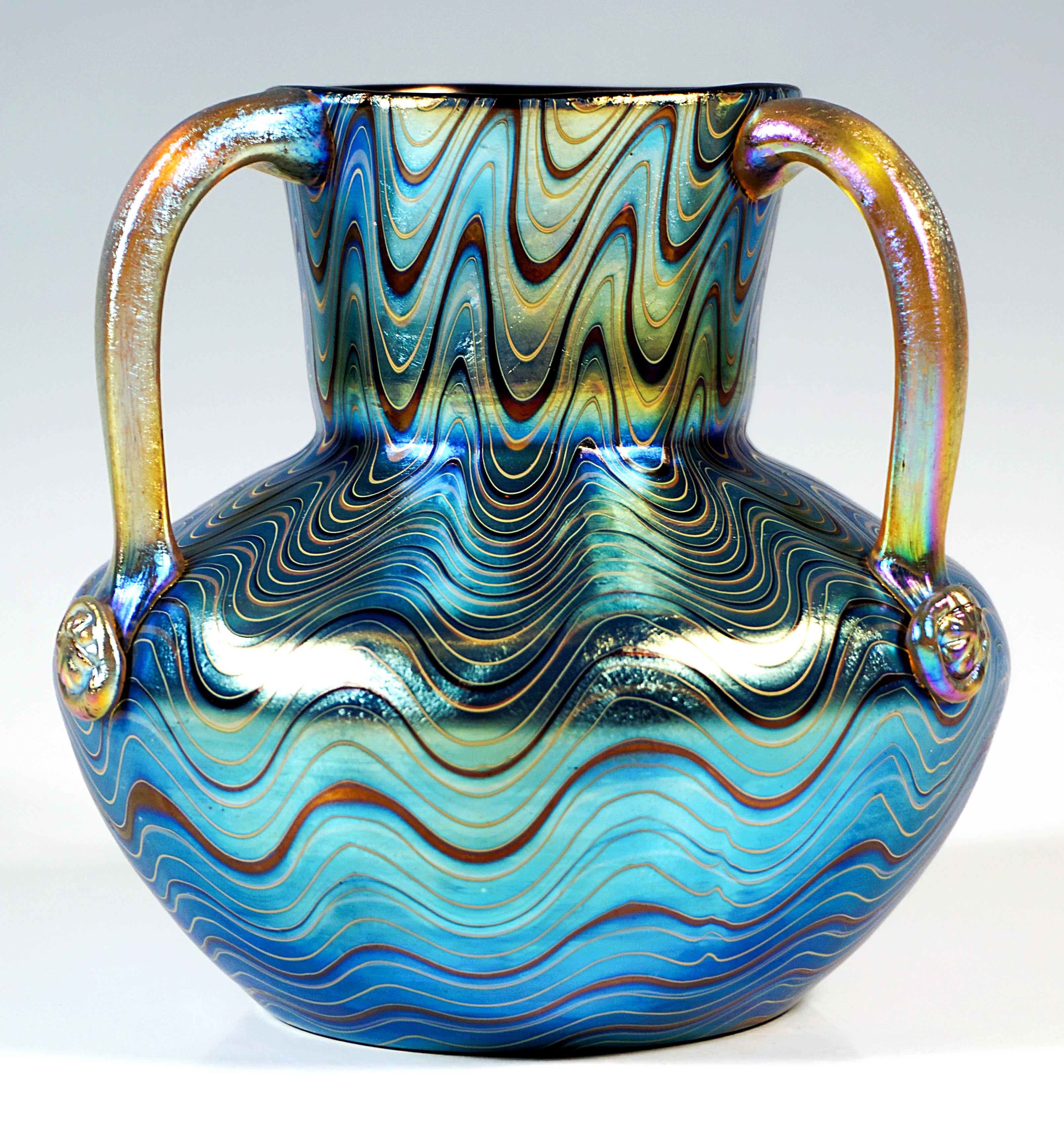 Finest Bohemian Art Nouveau Glass Vase:
Mould-blown, bulbous body with a wide, funnel-shaped neck, three handles applied below the rim and attached to the shoulders with stamped rosettes, on a flush stand with a polished pontil, ground signature