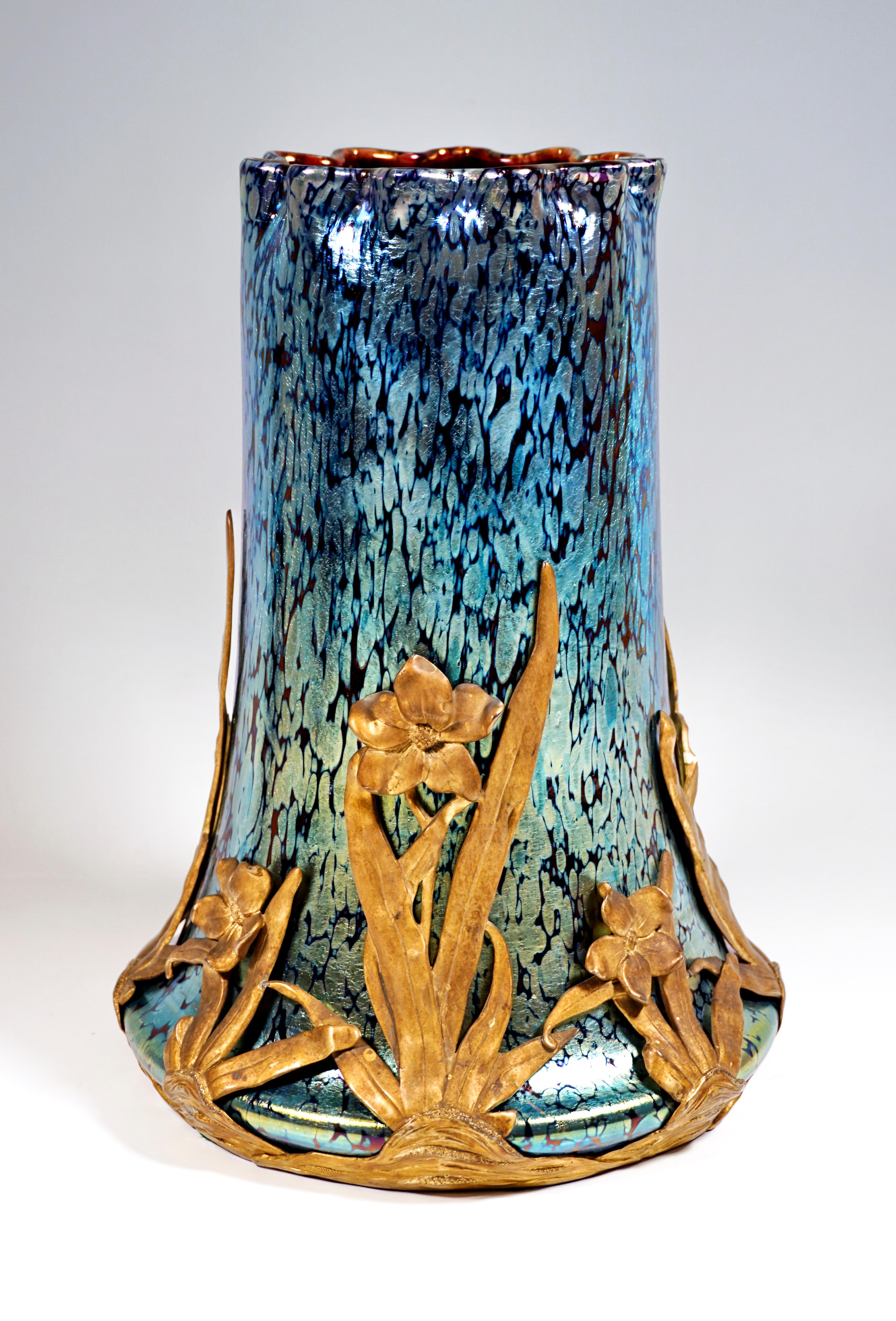 Finest large Bohemian Art Nouveau glass vase in the form of a blown tubular body with a wide round base, drawn up briefly on the stand and then narrowing slightly upwards and forming a high, wide neck, pressed in 11-fold wave-shaped at the edge of