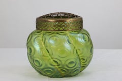 Loetz (attributed). A green swirl glass flower holder with decorative brass top