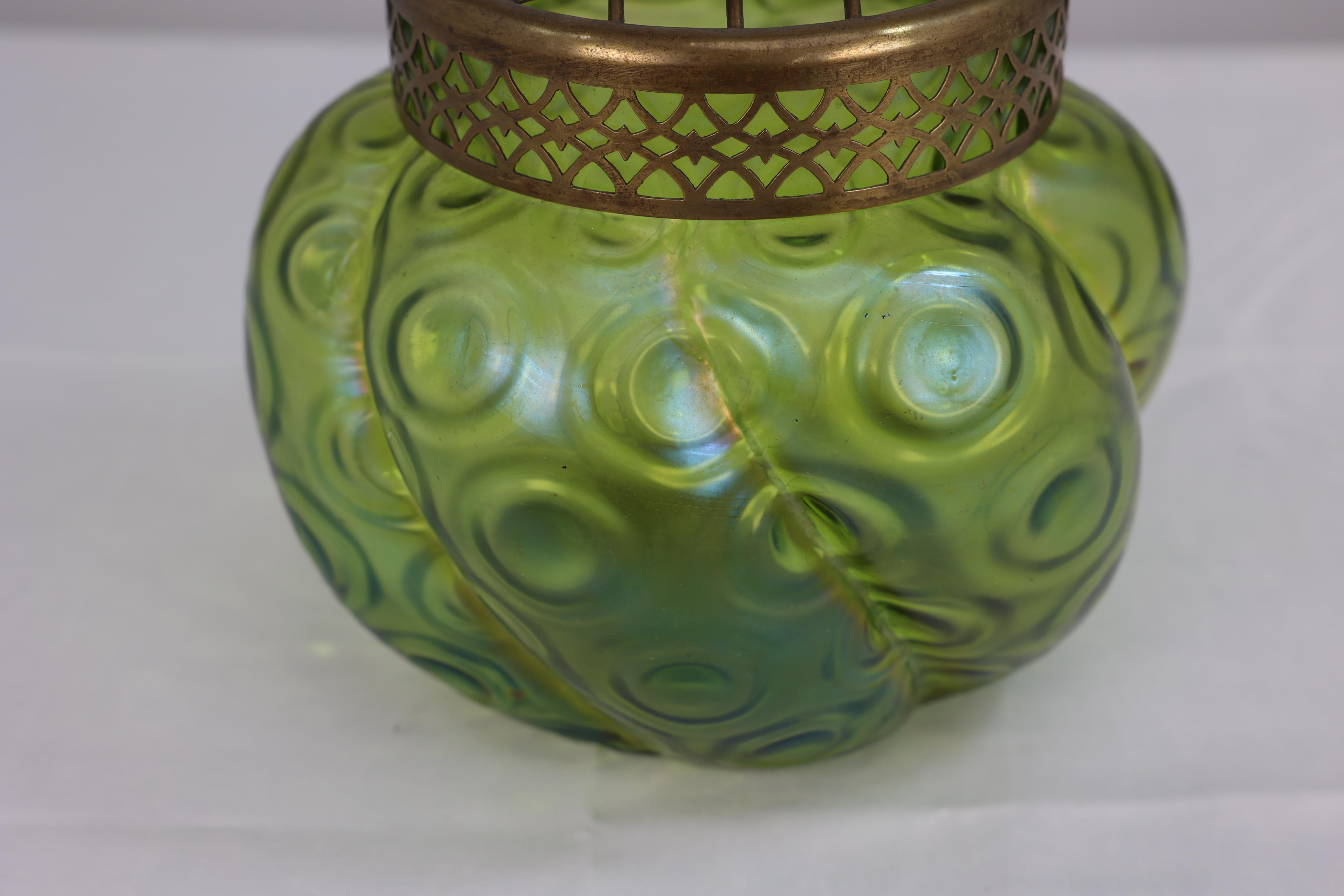 Glass Loetz (attributed). A green swirl glass flower holder with decorative brass top For Sale