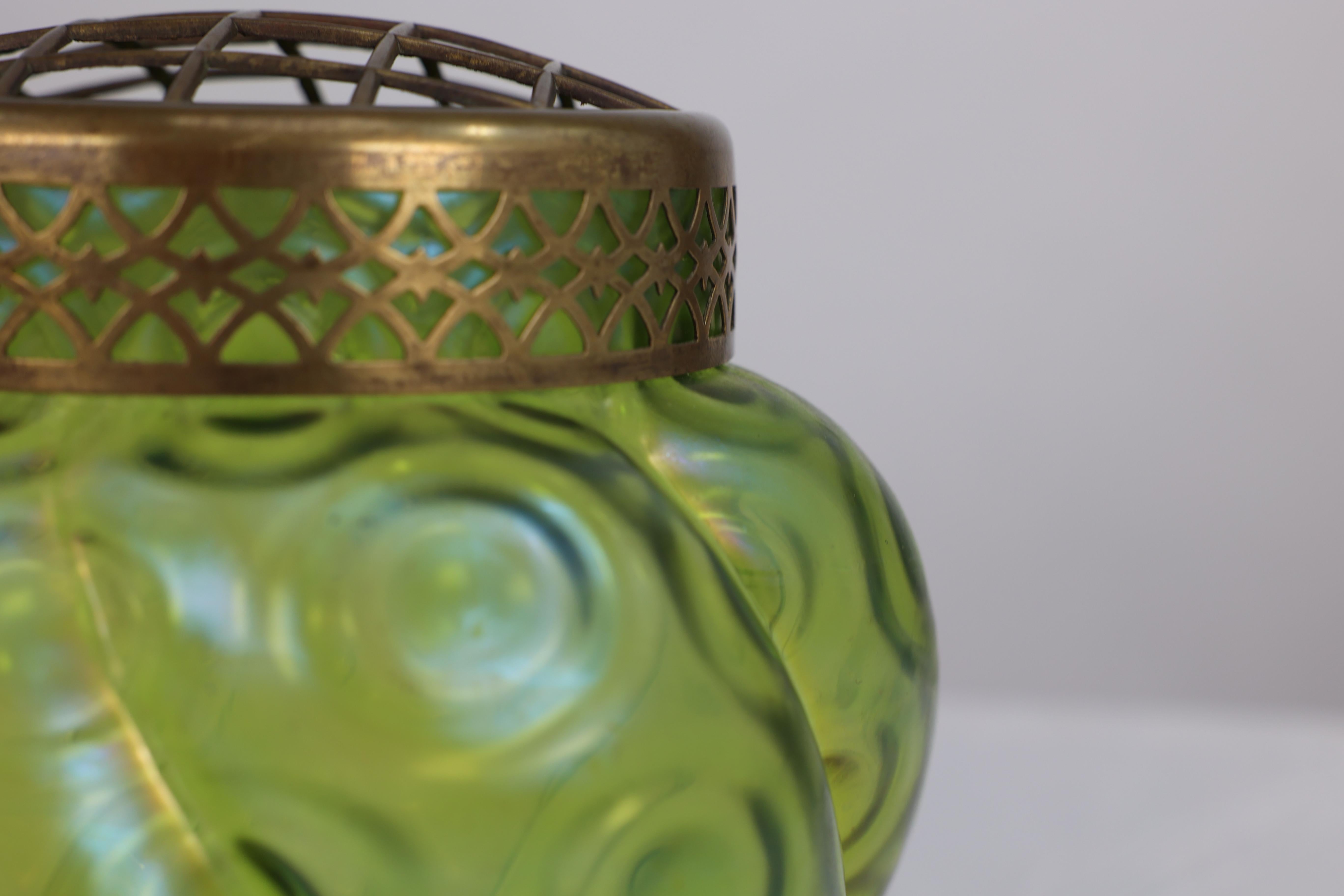 Loetz (attributed). A green swirl glass flower holder with decorative brass top For Sale 1