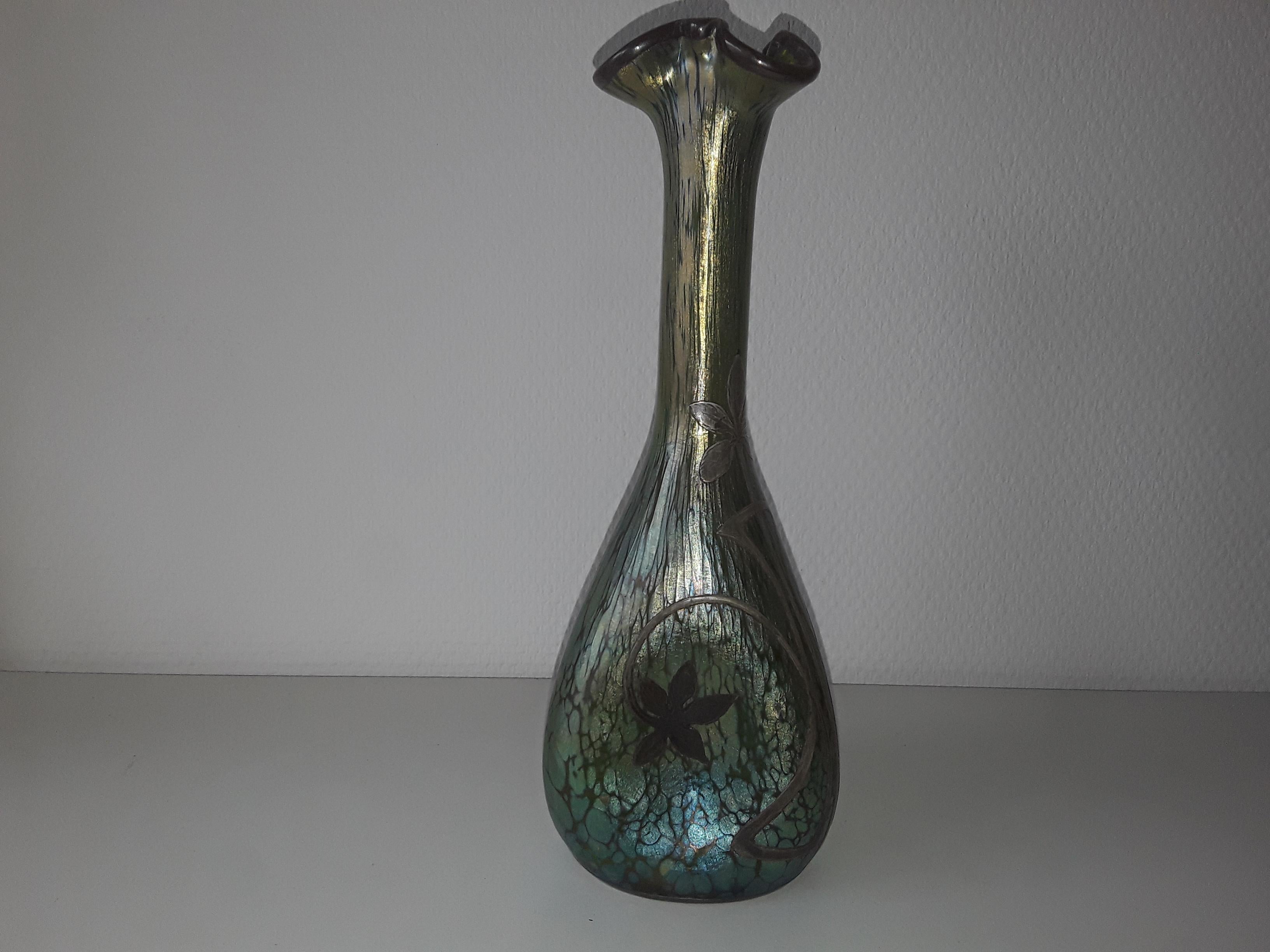 Loetz green papilon with silver overlay, 1898.