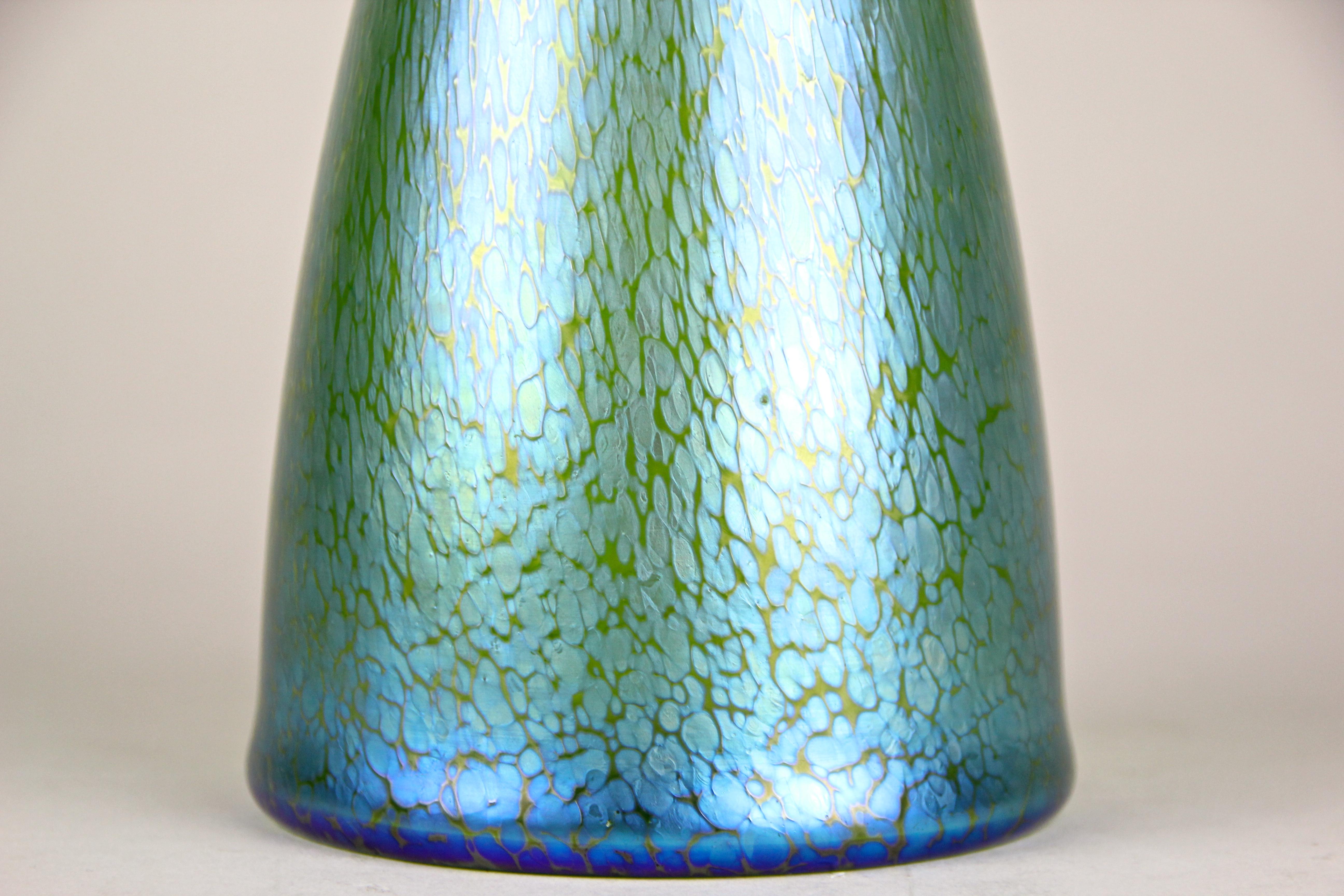 Stunning Loetz glass vase by Koloman Moser for E. Bakalowits made in Klostermuehle/ Bohemia, circa 1899. This rare Bohemian glass vase was designed by none other than world-famous Austrian artisans Koloman Moser, especially for E. Bakalowits. The