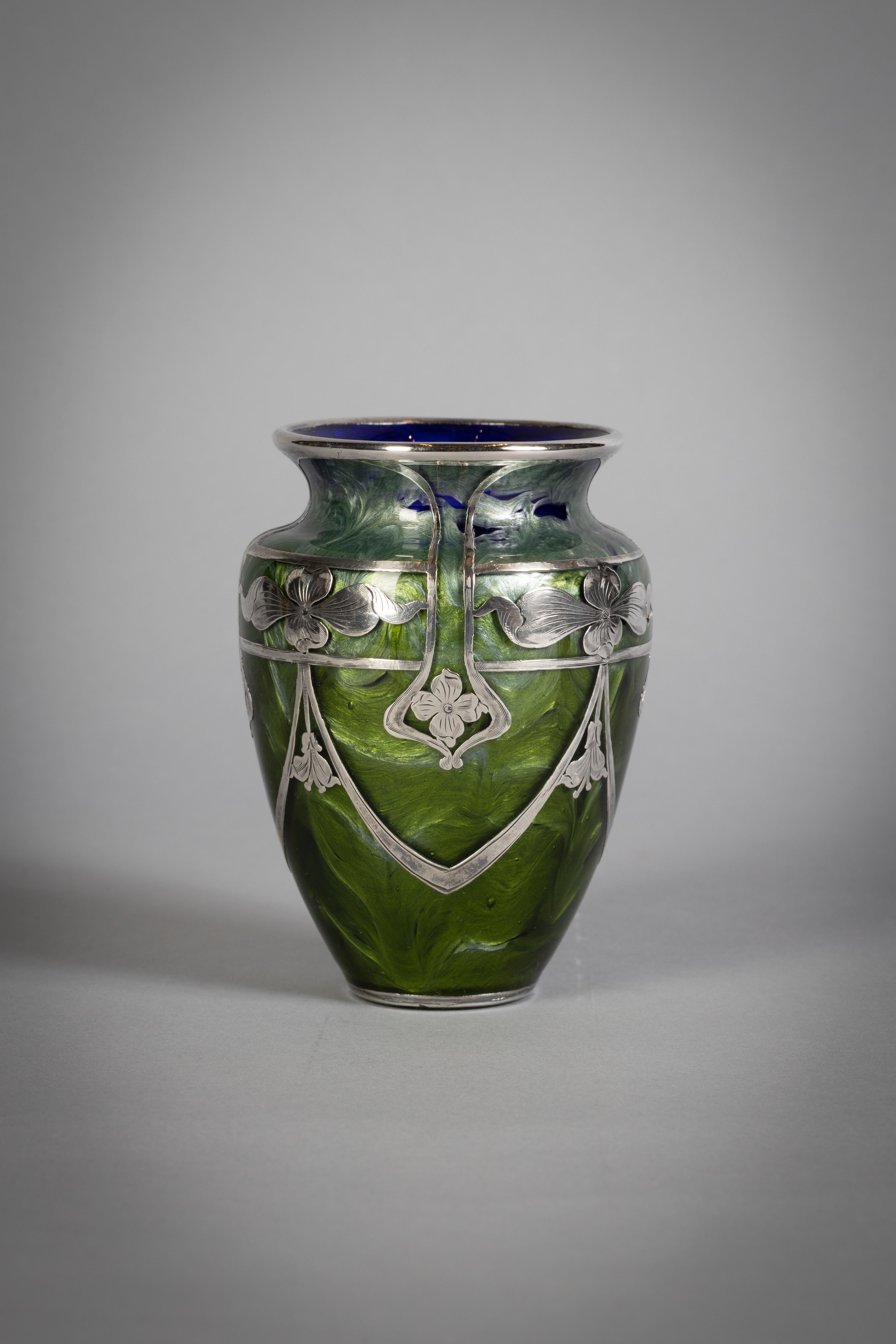Loetz Glass vase with sterling silver overlay, circa 1900.