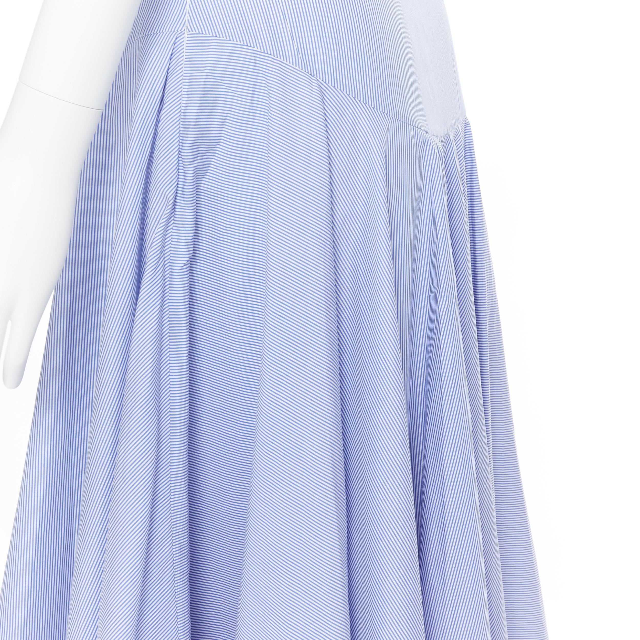 LOEWE 100% cotton blue whtie stripe belted dropped waist casual midi skirt FR34
Brand: Loewe
Designer: JW Anderson
Model Name / Style: Cotton midi skirt
Material: Cotton
Color: Blue
Pattern: Striped
Closure: Zip
Extra Detail: Attached belt