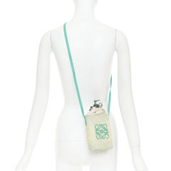 LOEWE 2023 Paula's Ibiza Melange Iraca Palm anagram woven crossbody bucket bag