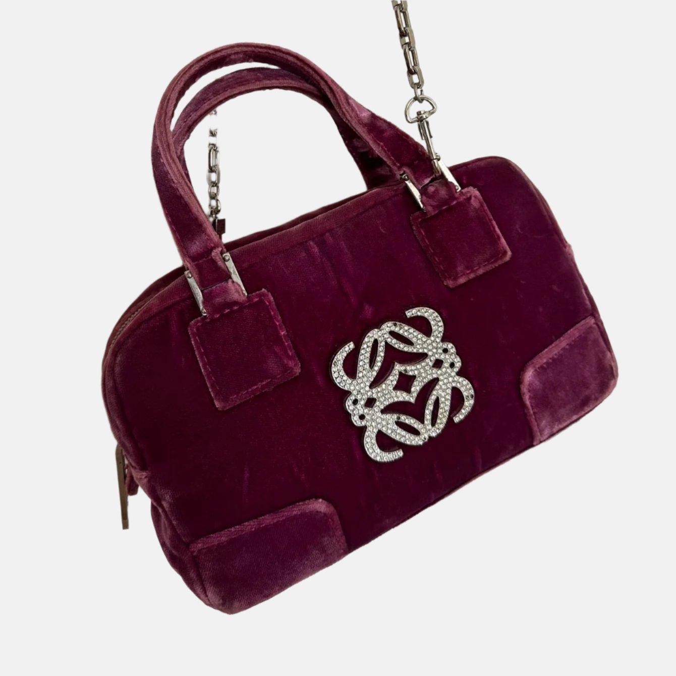 Loewe Amazona 19 Mini Handbag in Purple Velvet with Crystal Logo
 These are professional photos of the actual bag offered by Luxbags.
 Top handle bag in boxy trunk style is back in fashion in 2024 thanks to shows by Prada and Miumiu. The Loewe
