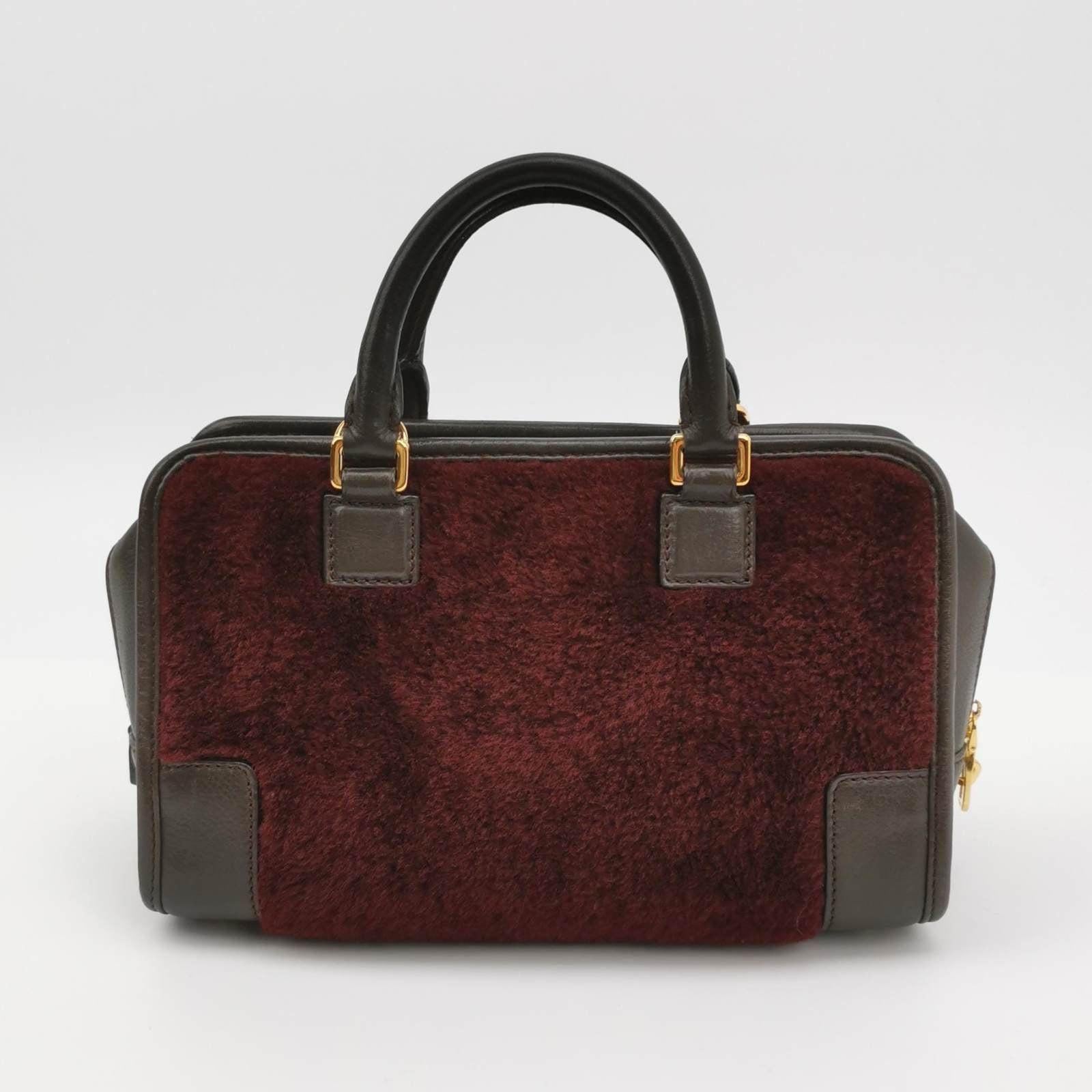 Loewe Amazona 23 in Burgundy Lambskin Leather and Shearling with Strap In Excellent Condition In AUBERVILLIERS, FR