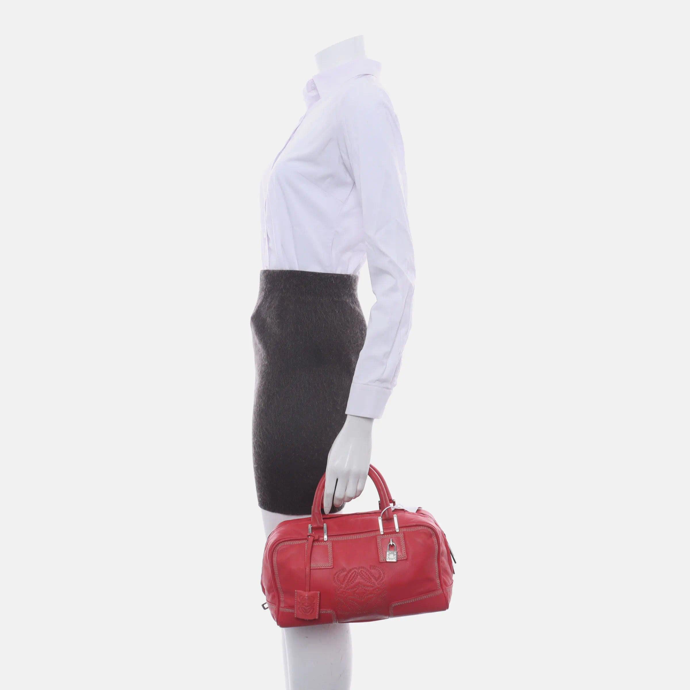 Loewe Amazona 29 Red Calfskin Leather Zip Around These are professional photos of the actual bag offered by Luxbags. Top handle bag in boxy trunk style is back in fashion in 2024 thanks to shows by Prada and Miumiu. The Loewe Amazona bag is a