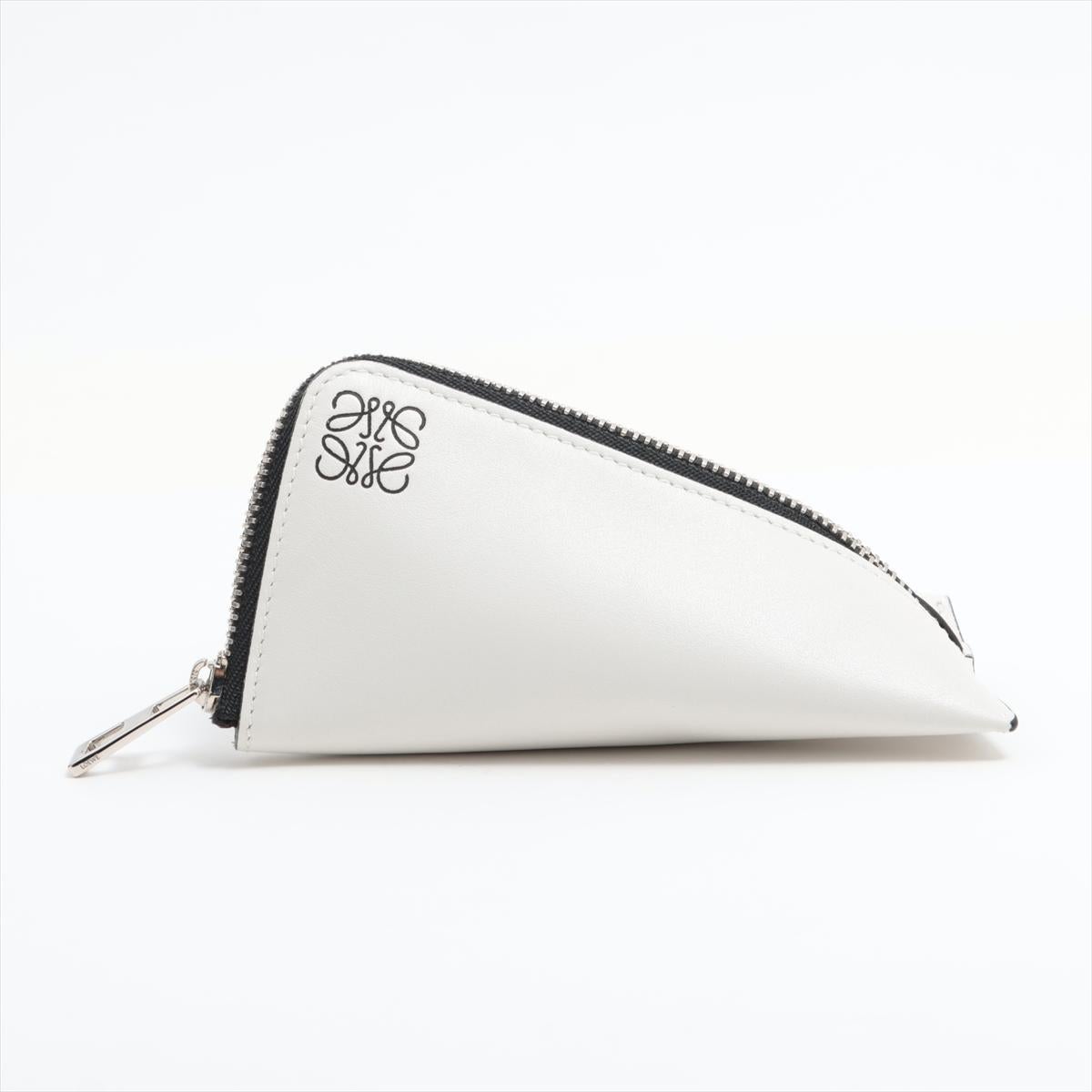 The Loewe Anagram Leather Coin Z Purse in white is a refined and compact accessory, perfect for carrying small essentials with style. Crafted from premium leather, it features a unique arc zip closure that adds a modern touch to its minimalist