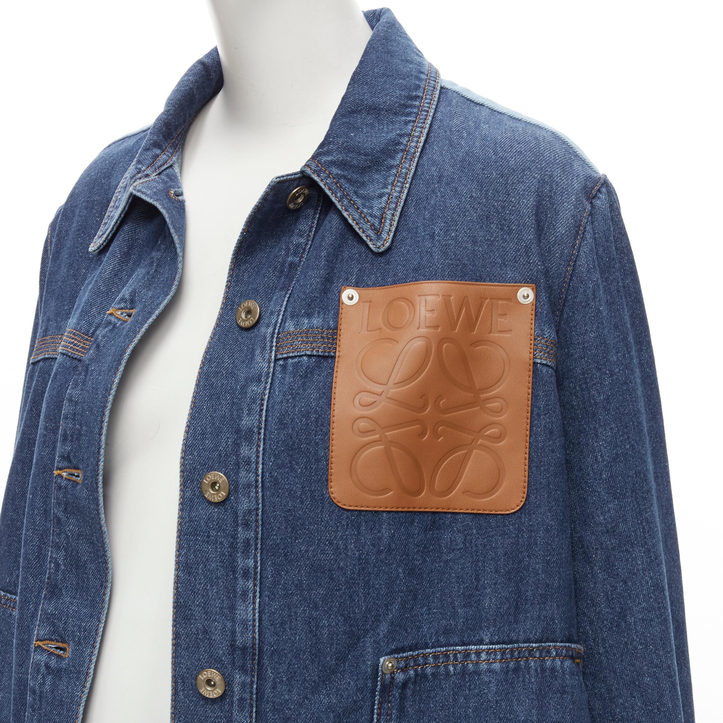LOEWE Anagram patch leather pocket tie side high low denim jacket FR38 XS
Brand: Loewe
Designer: JW Anderson
Material: Cotton
Color: Blue
Pattern: Solid
Closure: Button
Extra Detail: Tan leather LOEWE Anagram logo patch pocket. Button front. Dual