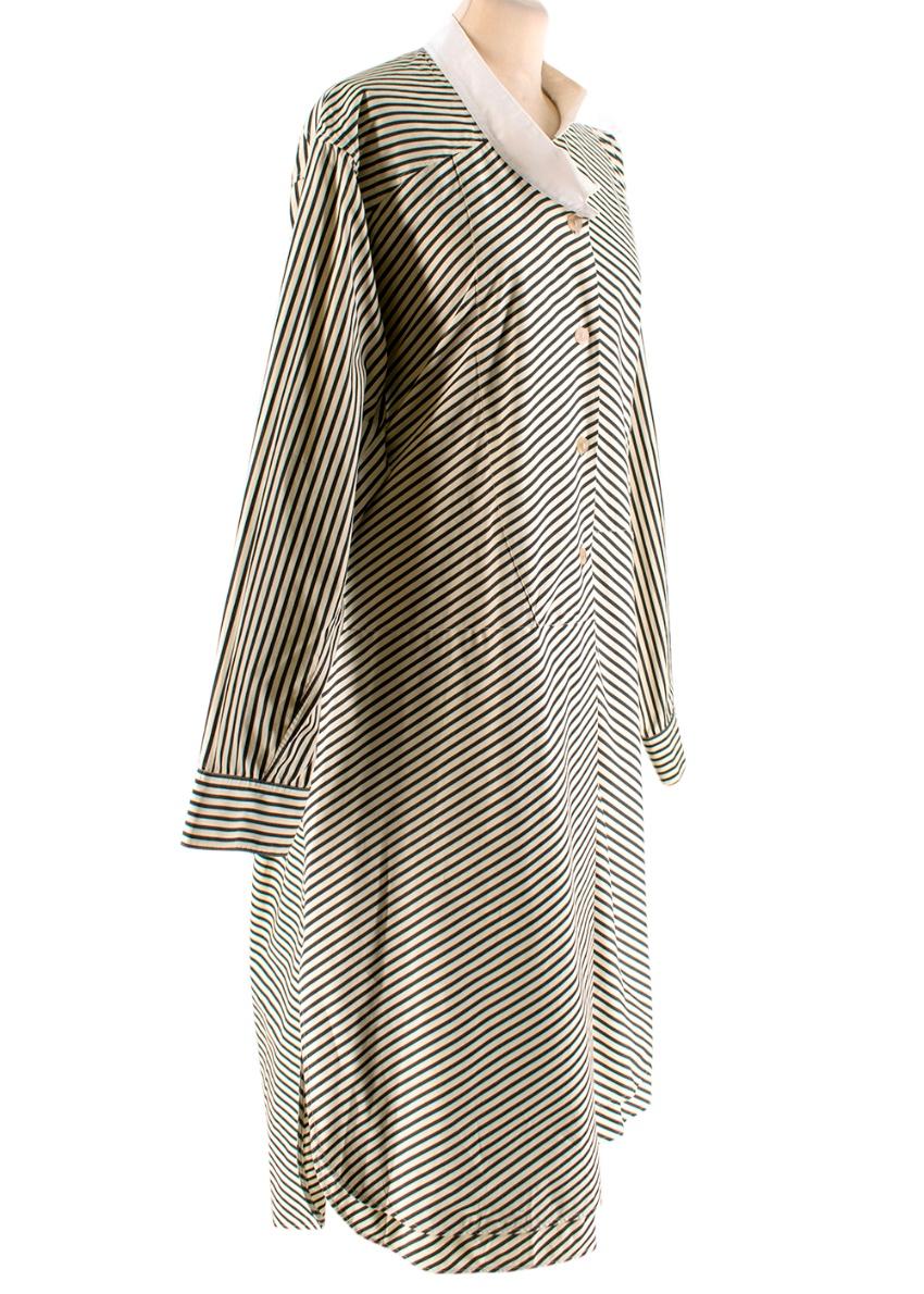 Loewe - Asymmetrical shirt dress 

-loose fit midi dress 
- black and ivory/beige striped undertone 
- button up 
- bow tie detail belt for a tailored fit

Please note, these items are pre-owned and may show some signs of storage, even when unworn
