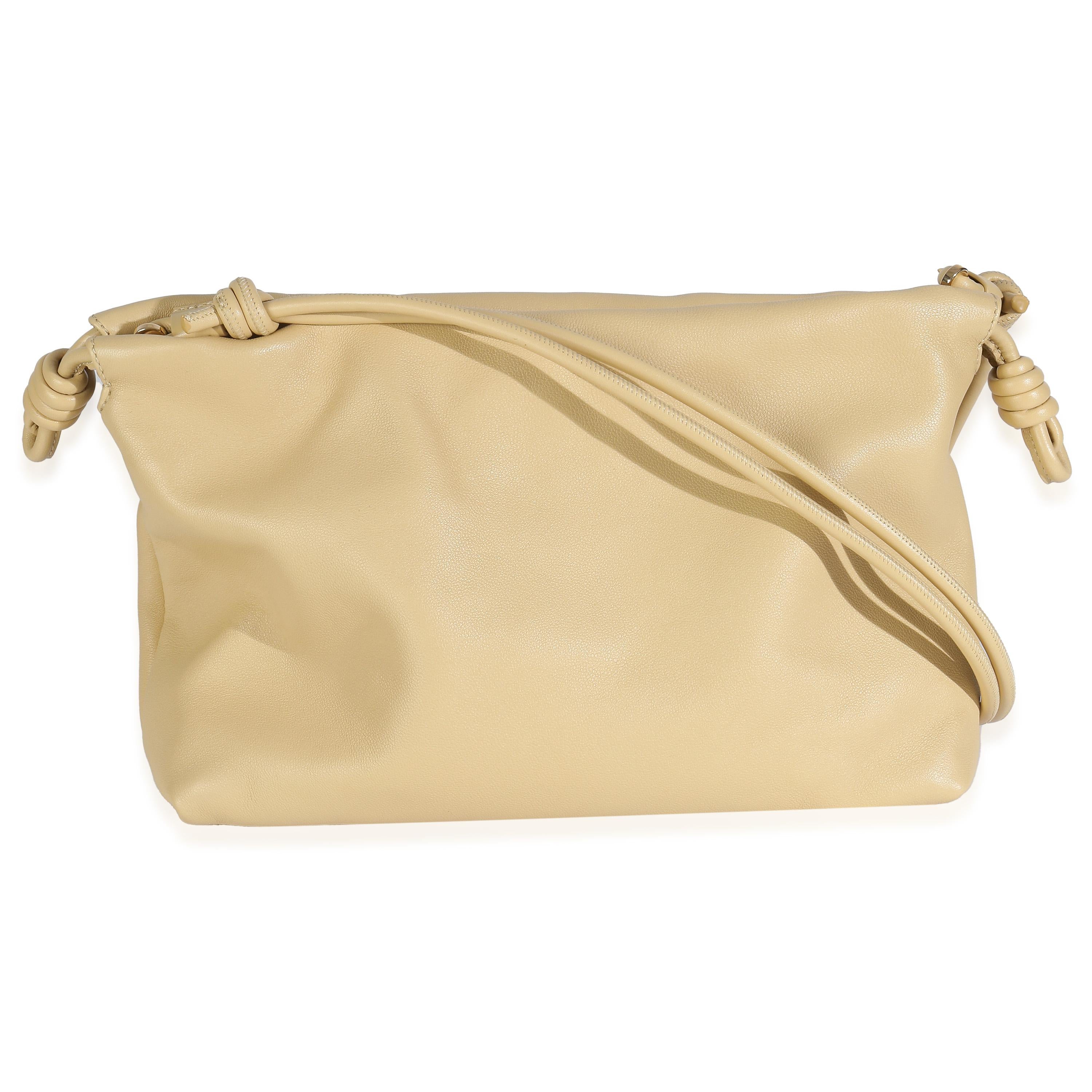 Listing Title: Loewe Beige Mellow Nappa Donut Chain Medium Flamenco Purse
SKU: 148013
MSRP: 3990.00 USD
Condition: Pre-owned 
Handbag Condition: Pristine
Condition Comments: Item has no indication of wear.
Brand: Loewe
Model: Medium Flamenco