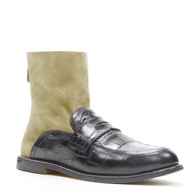 LOEWE nero nero pelle squamata goffrata marrone camoscio calzino stivale EU36
Riferimento: ANWU/A00373
Marchio: Loewe
Designer: JW Anderson
Materiale: Pelle, camoscio
Colore: Nero, Marrone
Modello: Tinta unita
Chiusura: zip
Fodera:  Pelle
Dettagli
