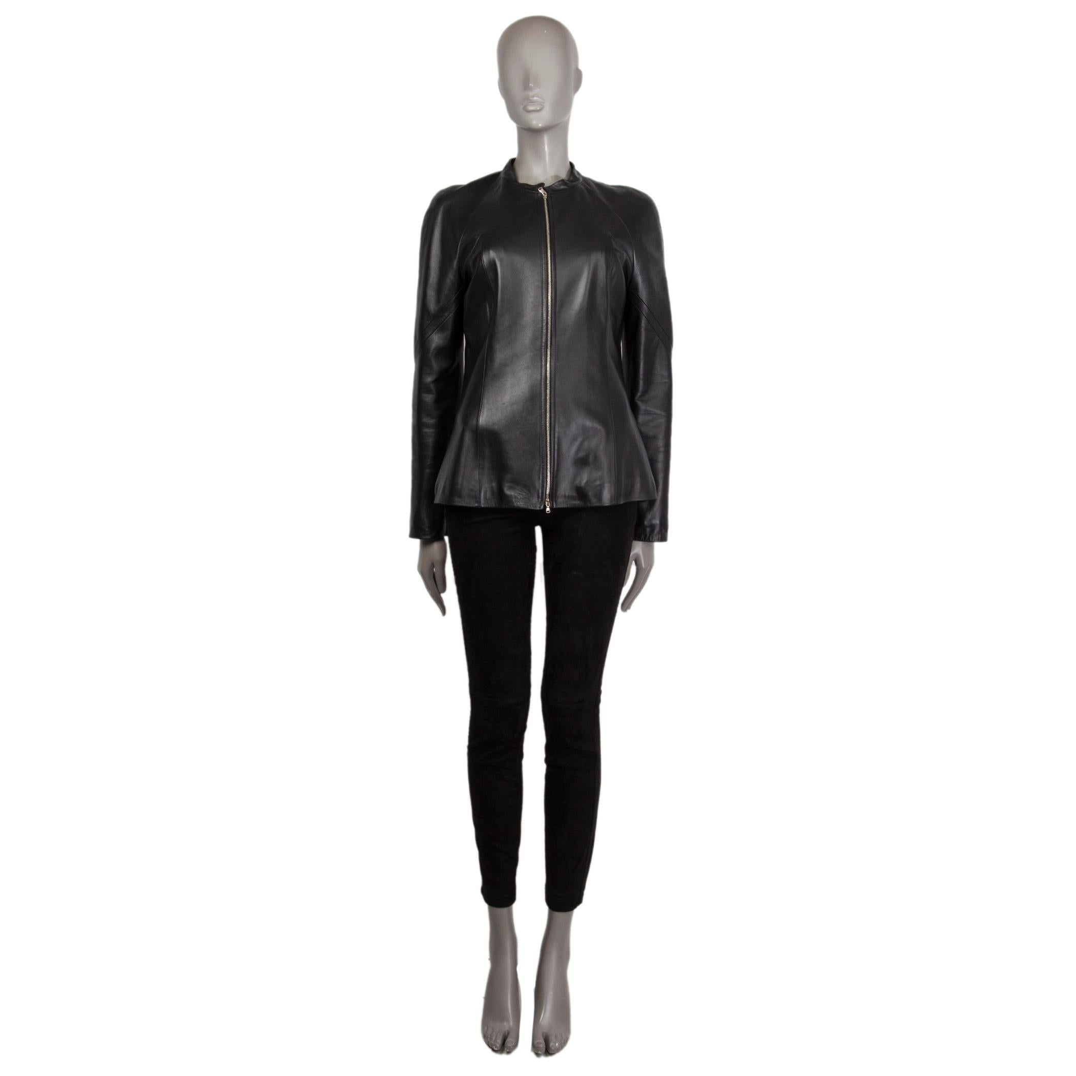 100% authentic Loewe band-collar jacket in black lambskin. With raglan sleeves. Closes with two-way silver-tone zipper on the front. Lined in quilted fabric. Has been worn and is in excellent condition. 

Measurements
Tag Size	42
Size	M
Bust