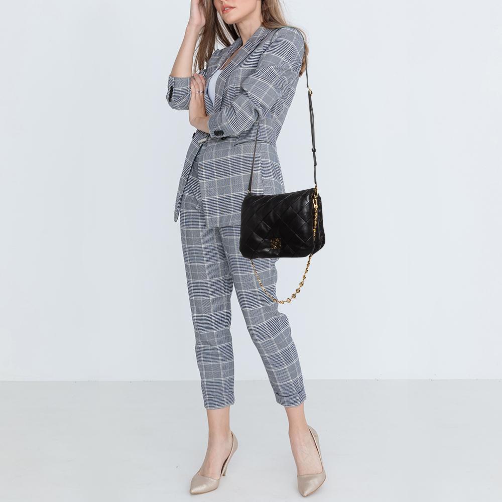 Designer bags are ideal companions for ample occasions! Here we have a fashion-meets-functionality piece crafted with precision. It has been equipped with a well-sized interior that can easily fit all your essentials.