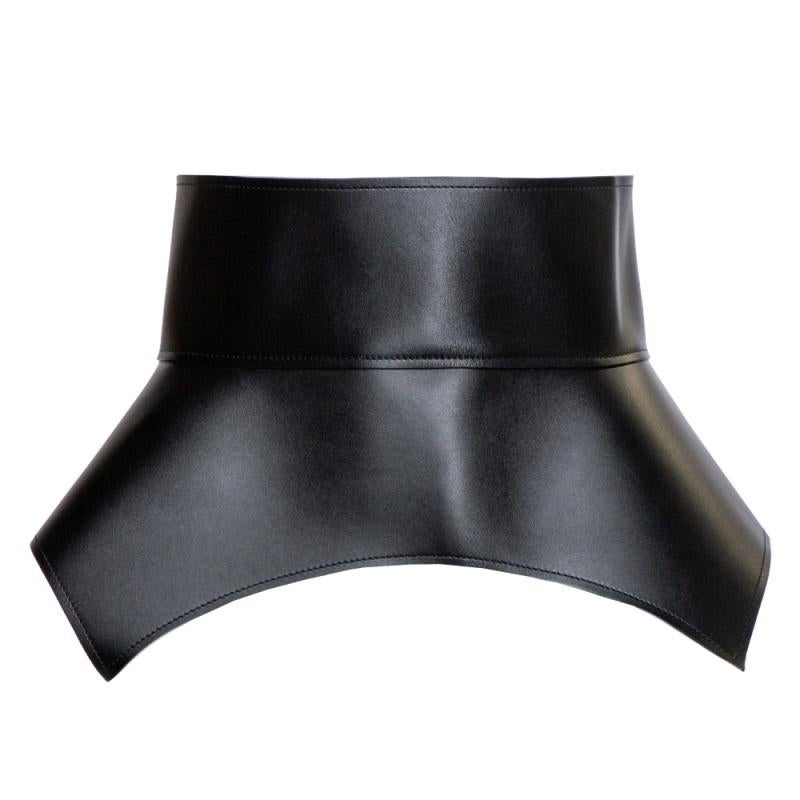Made in Spain, Loewe's Obi waist belt is cut from leather in a peplum style. It has sharp cuts, tie detailing at the back, and an overall luxe design. It can be styled with dresses, jumpsuits, or chic suits.

Includes: Original Dustbag, Info Booklet
