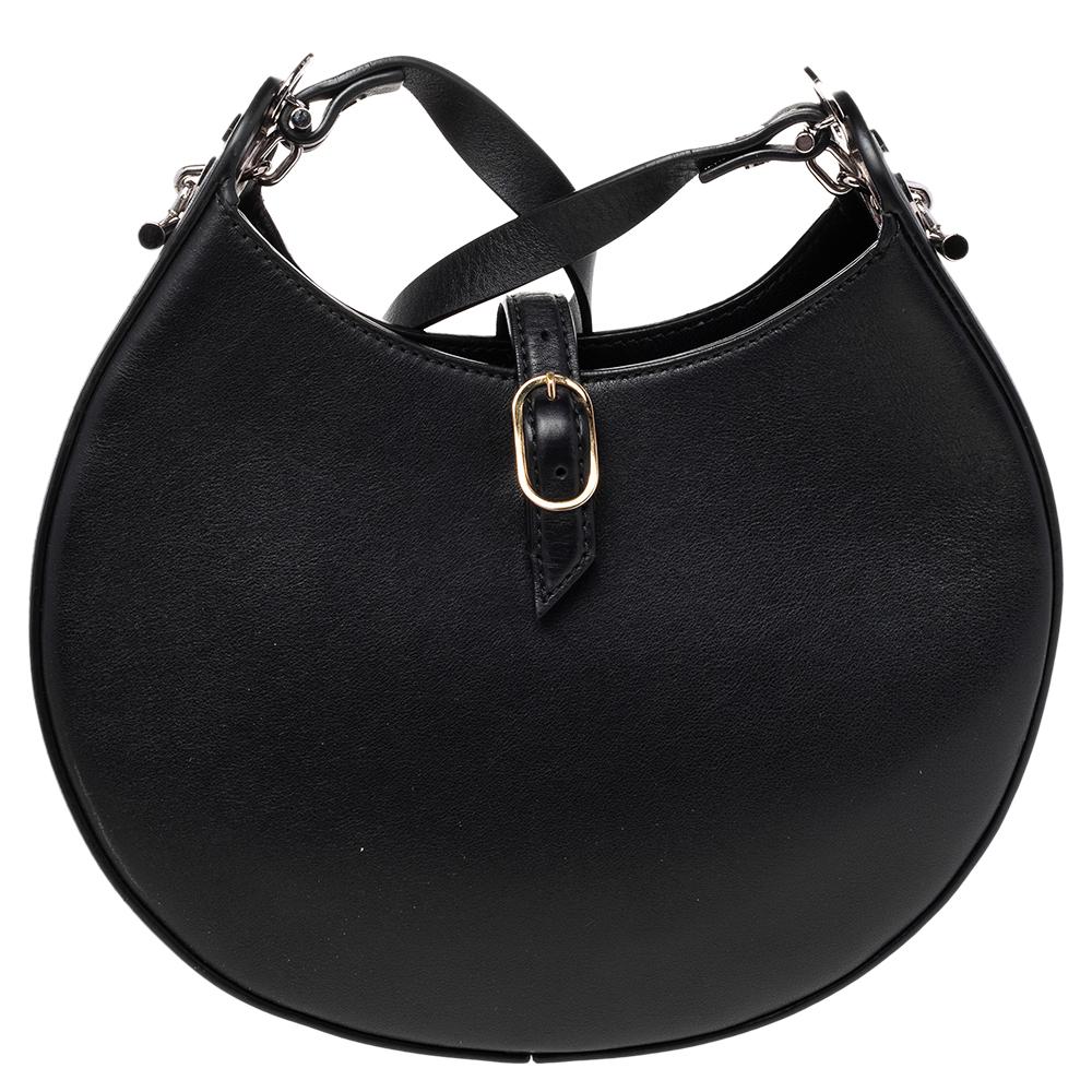 Loewe's designs are sensible and minimal yet luxurious, making them perfect additions to a well-curated wardrobe. The Joyce shoulder bag is an absolute favorite for everyday use. Compact and handy, this small Joyce bag in black leather brings the