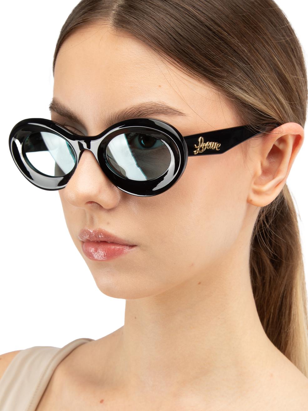 CONDITION is New with tags on this brand new Loewe designer item. This item comes with original packaging.
 
 
 
 Details
 
 
 SS24
 
 Model: LW40110U
 
 Black
 
 Acetate
 
 Oval eye sunglasses
 
 Tinted Blue lenses
 
 Logo on arms
 
 Full rim
 
