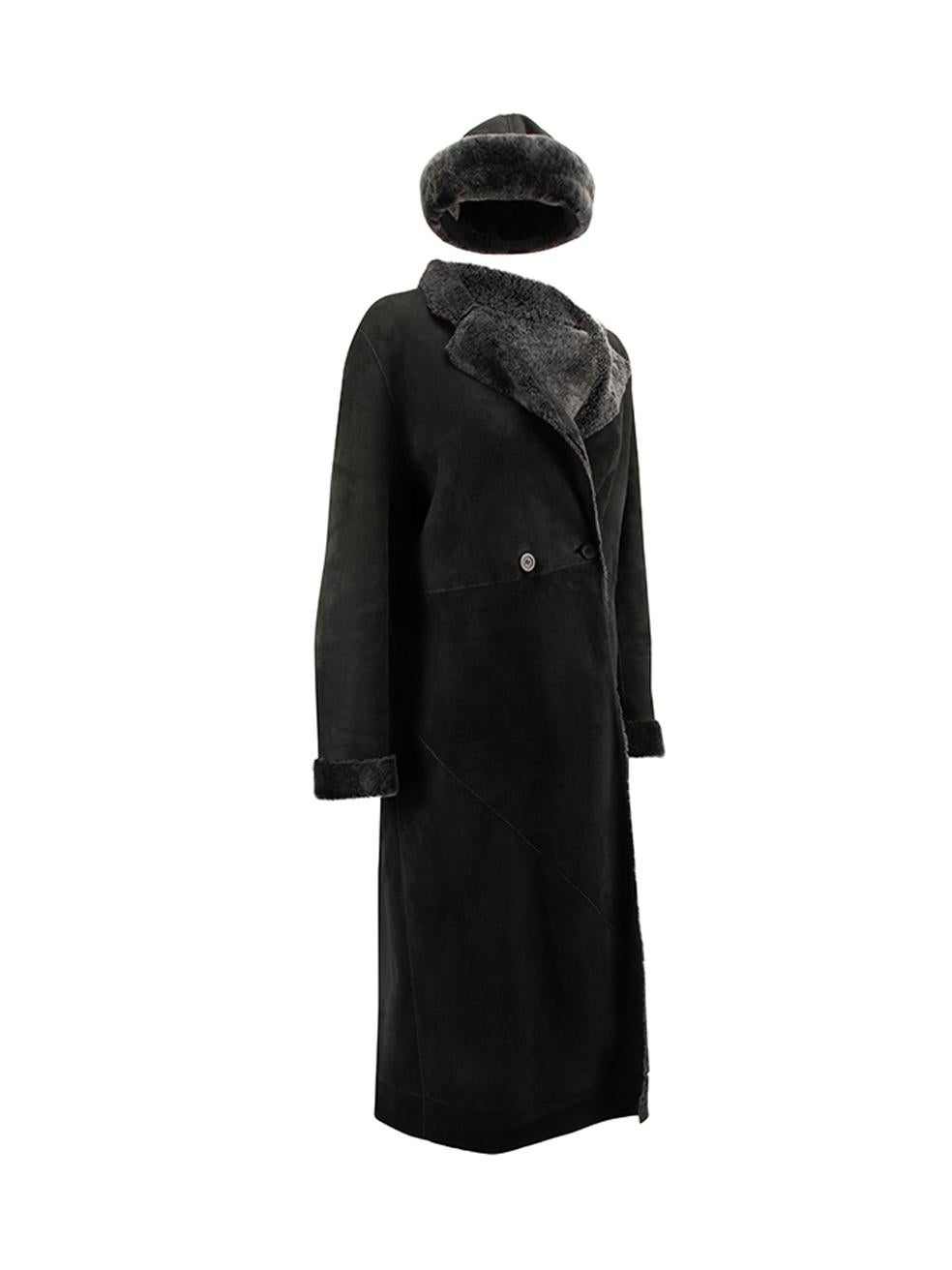 CONDITION is Very good. Minimal wear to coat is evident. Minimal wear to the brand label as one side has become unstitched on this used Loewe designer resale item. 
 
 Details
 Black
 Suede
 Long coat
 Double breasted
 Matching trapper hat
