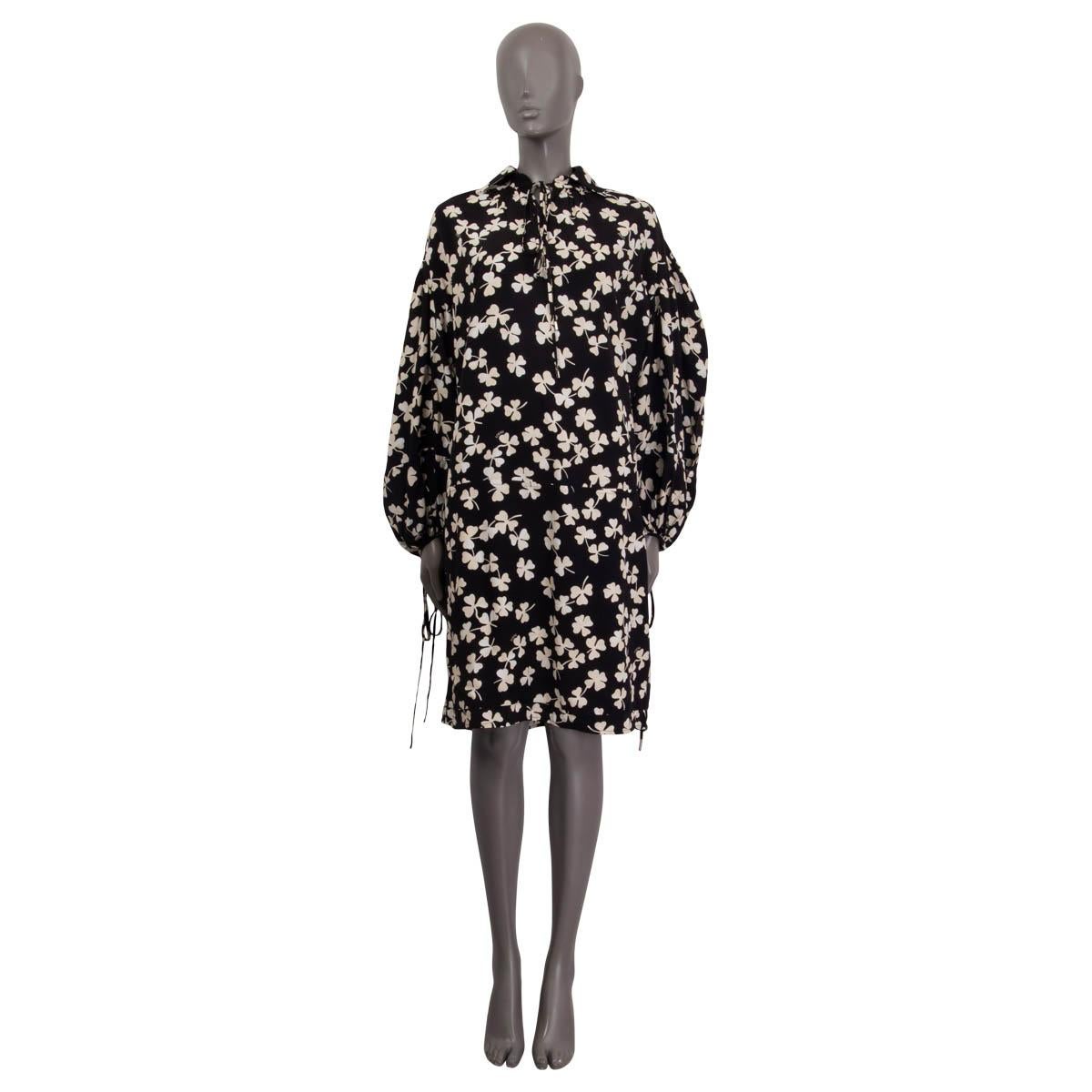 100% authentic Loewe shamrock print dress in black and off-white viscose (100%). Features ribboned cuffs and a ribboned neck. Unlined. Has a barely visible stain on the front and the belt is missing otherwise in excellent condition.