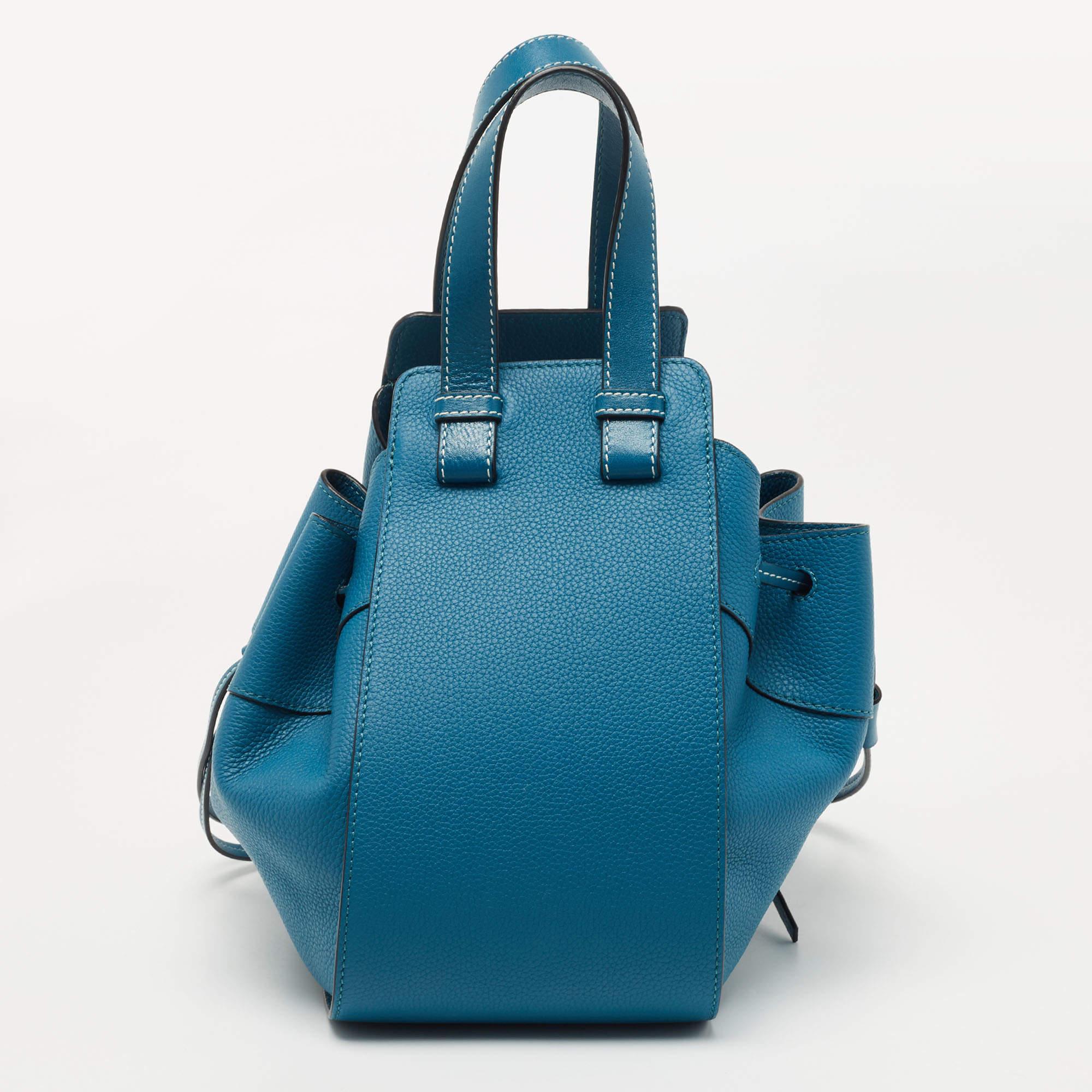 Carry this shoulder bag in style and experience complete luxury and practicality. It is created using quality material and features a stunning style, a shoulder strap, and a roomy interior.

Includes: Original Dustbag, Detachable Strap