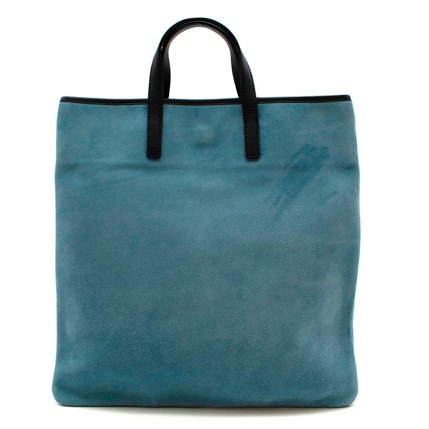 Loewe Blue Suede Top Handle Vintage Tote Bag

- Made of soft velvet like suede 
- Iconic logo embossed to the front 
- Gorgeous blue hue 
- Contrasting navy trims and handles
- Magnetic fastening to the top 
- Original dust bag 
- Timeless elegant
