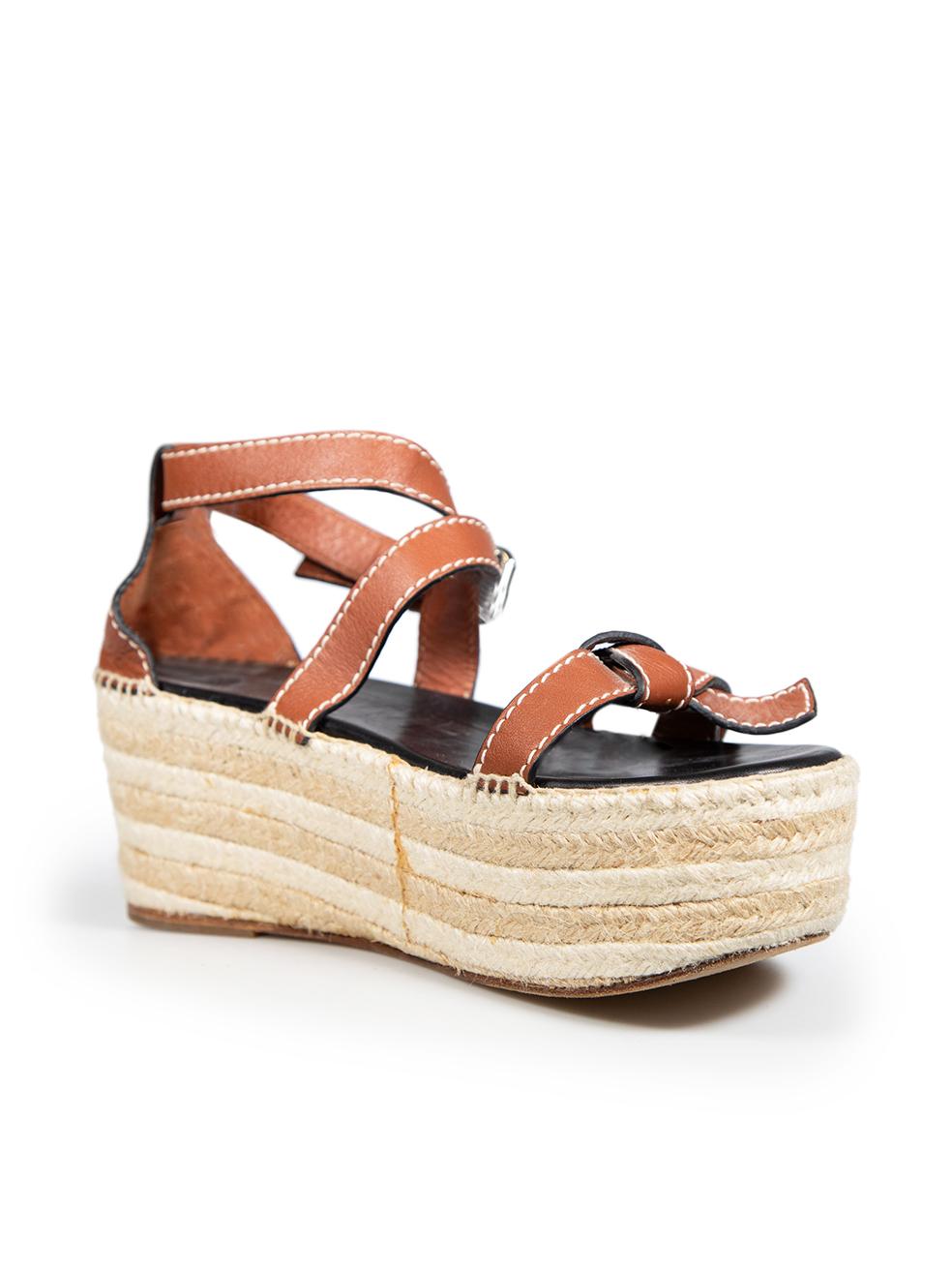 CONDITION is Very good. Minimal wear to shoes is evident. Minimal wear to platforms, light staining on the right side of the left shoe and left side of the right shoe, abrasion to the tip of the right shoe on this used Loewe designer resale item.
 
