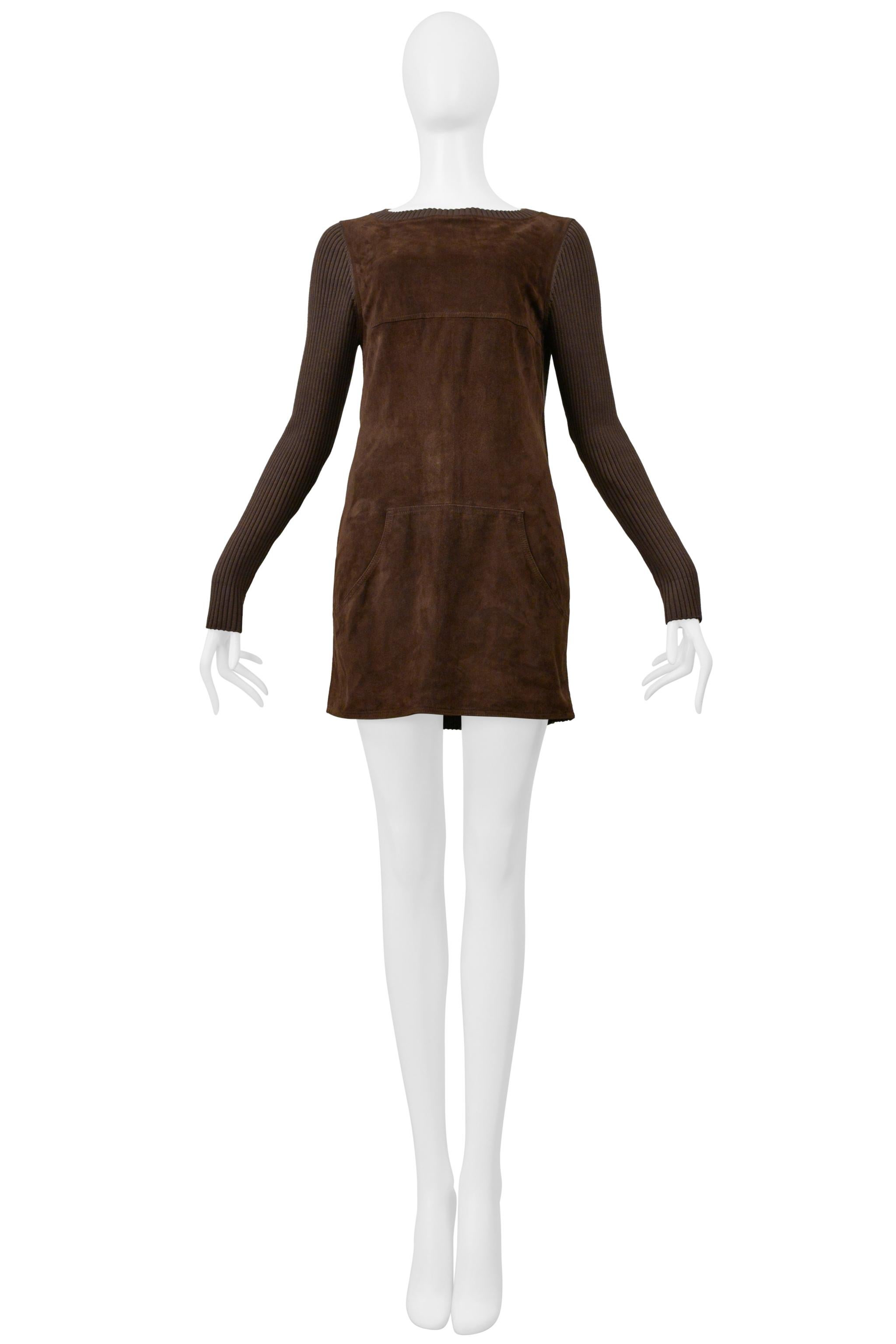 Resurrection Vintage is excited to present a rare vintage Loewe brown suede mini dress featuring a ribbed knit back panel and sleeves, a suede front panel with kangaroo pocket detail, and a mini length. 

Loewe
No Size label fits like 2-4

The