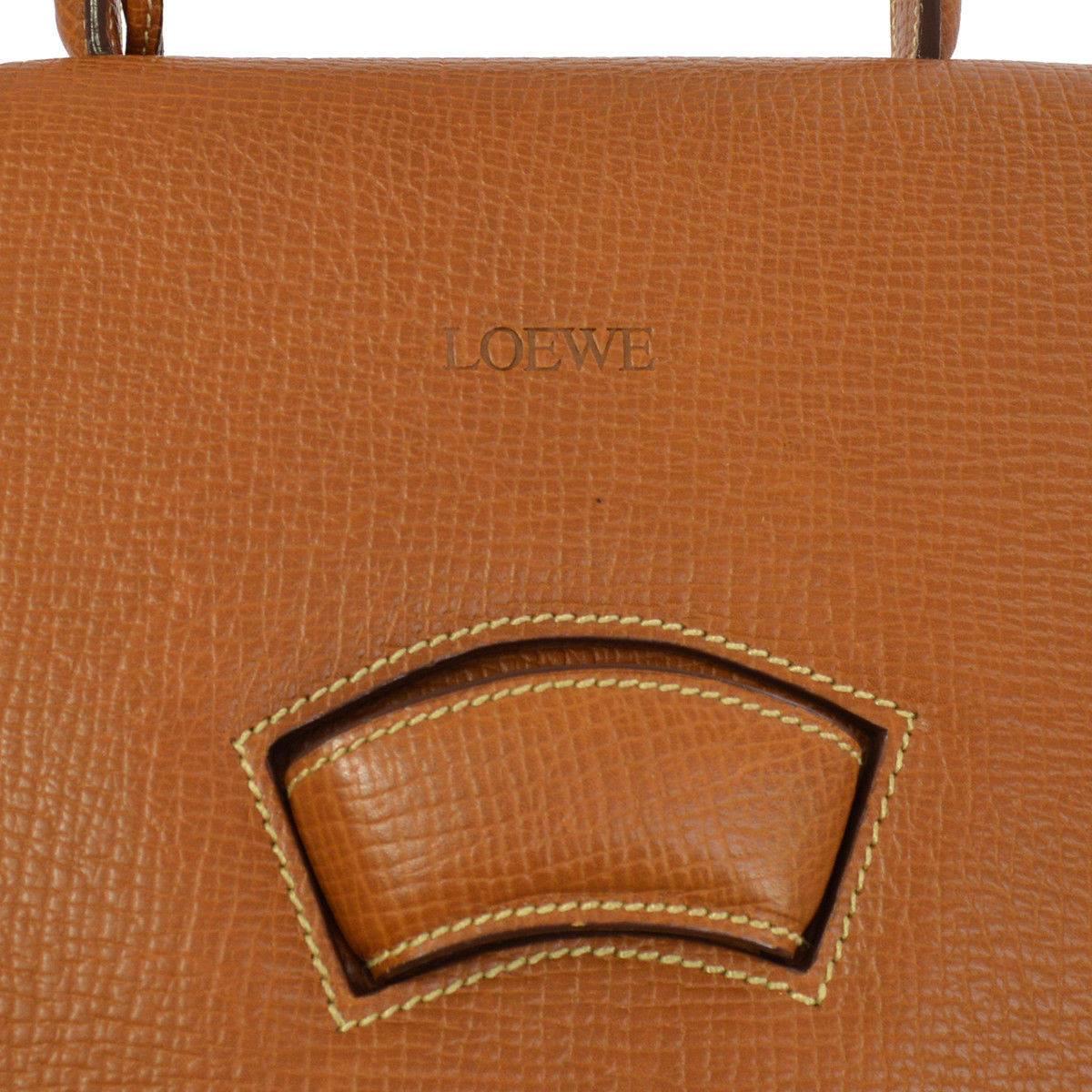 
Loewe Cognac Leather Evening Top Handle Satchel Shoulder Flap Bag
Leather
Suede lining
Made in Spain
Top Handle drop 4