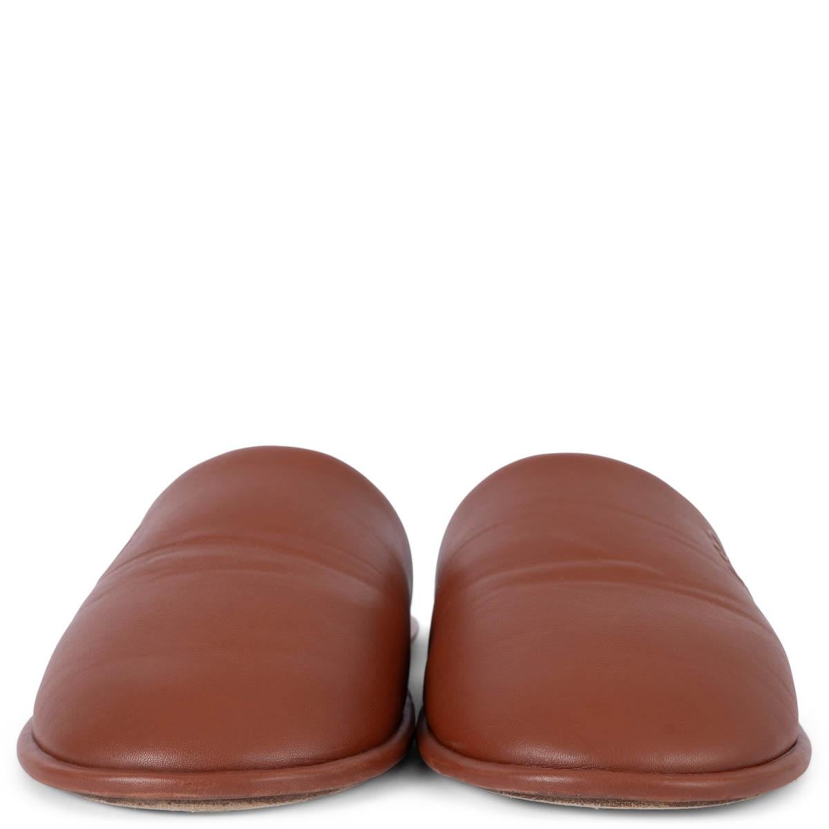 100% authentic LOEWE slippers in tan smooth leather embossed with the 'Anagram' logo and set on comfortable cushioned soles. The sleek design features round toes. Have been worn and are in excellent condition. 

Measurements
Imprinted Size	39 (run
