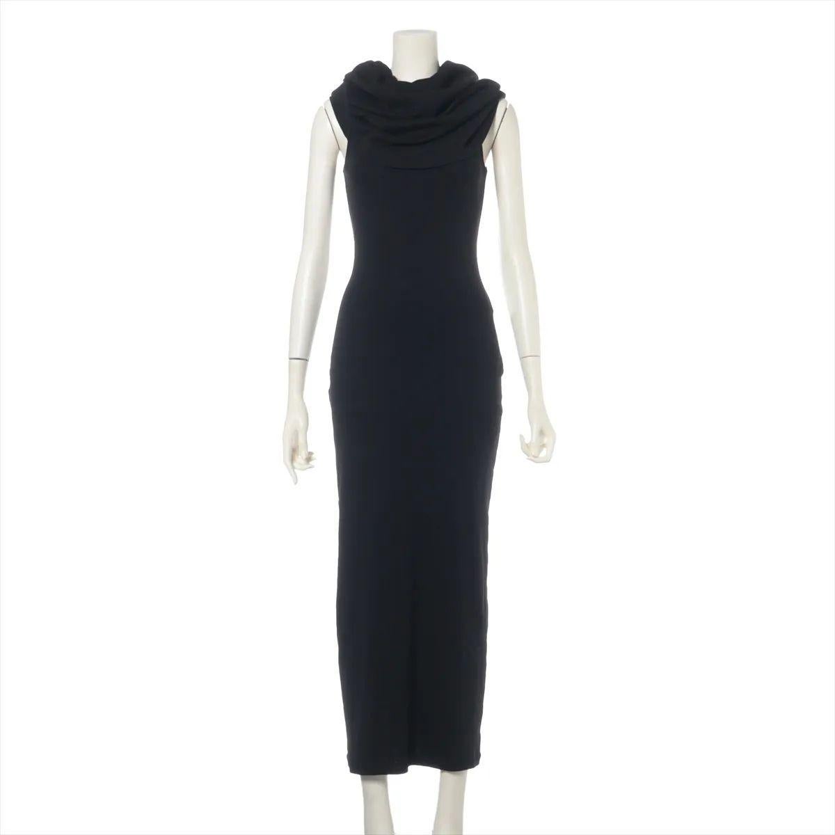 La robe longue bodycon en coton de Loewe, en noir, est une pièce élégante et polyvalente qui incarne l'élégance discrète. Confectionnée en coton doux de haute qualité, cette robe présente une silhouette moulante qui accentue les courbes naturelles