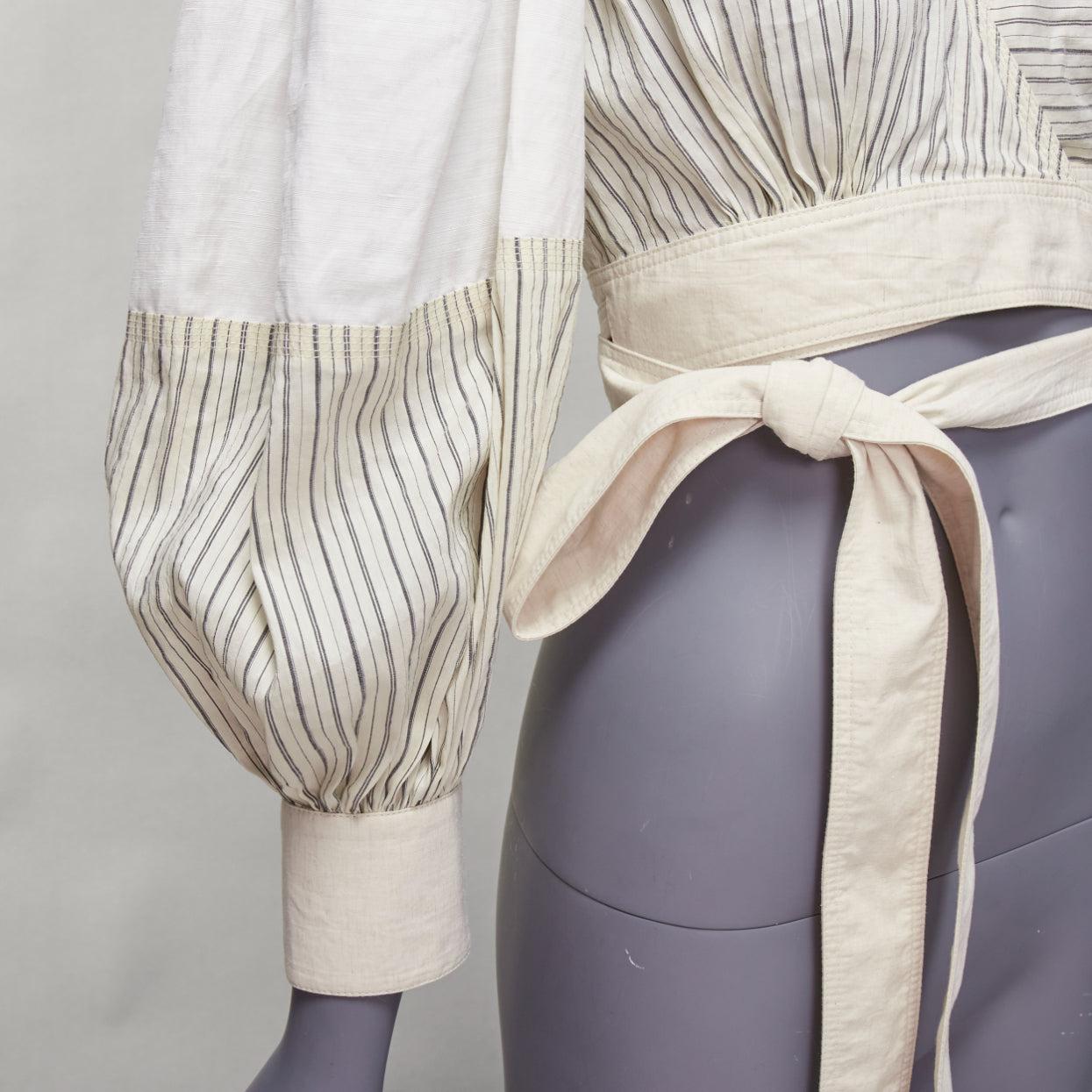 LOEWE cream cotton linen balloon sleeve pinstripe panels wrap crop top FR34 XS
Reference: TGAS/E00032
Brand: Loewe
Designer: JW Anderson
Model: S540Y07W04
Material: Cotton, Linen
Color: Cream
Pattern: Pinstriped
Closure: Wrap Tie
Extra Details: Ecru