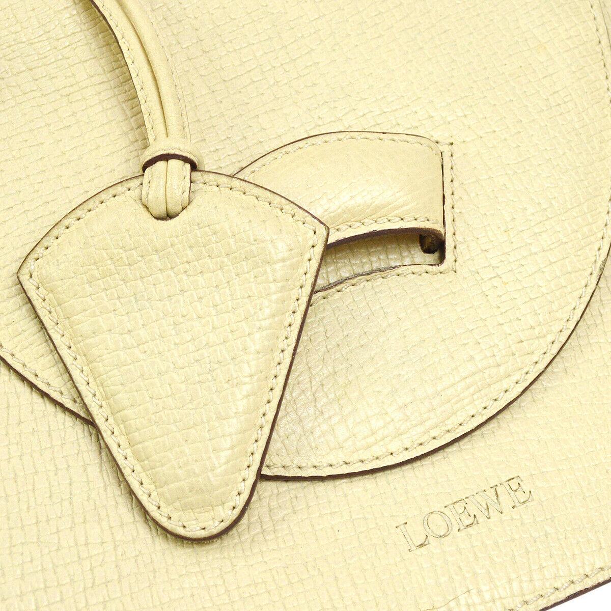 Loewe Cream Nude Leather Small Top Handle Kelly Style Evening Satchel Shoulder Flap Bag

Leather
Slip flap closure
Woven lining
Made in Italy
Handle drop 3.5