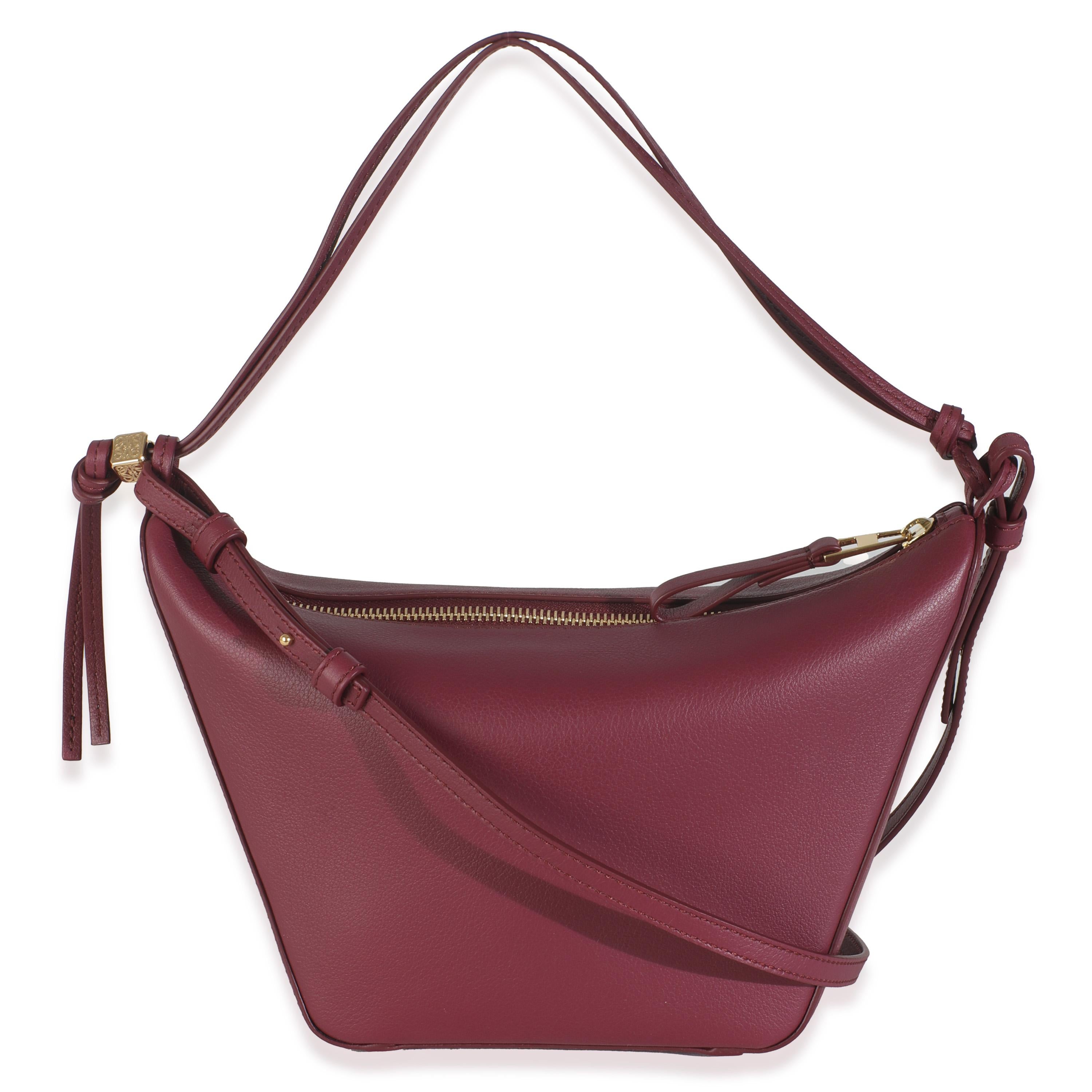 Listing Title: Loewe Crimson Calfskin Mini Hammock Hobo
SKU: 145796
Condition: Pre-owned 
Handbag Condition: Pristine
Condition Comments: Item has no indication of wear.  Final sale.
Brand: Loewe
Model: Mini Hammock Hobo
Origin Country: