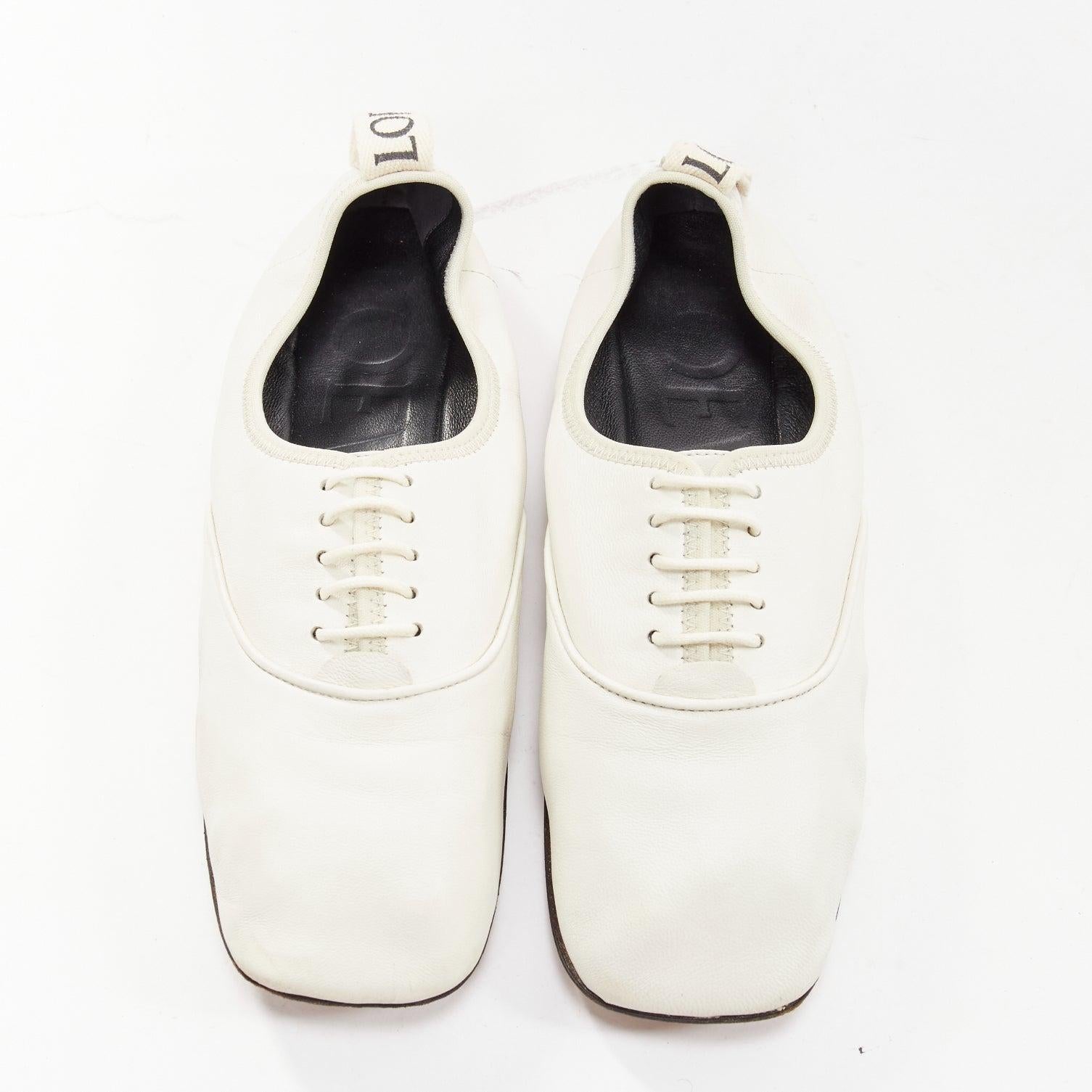 LOEWE Derby white soft leather black logo tab lace up flat shoes EU37
Reference: KYCG/A00041
Brand: Loewe
Designer: JW Anderson
Model: Derby
Material: Leather
Color: White, Black
Pattern: Solid
Closure: Lace Up
Lining: Black Leather
Extra Details: