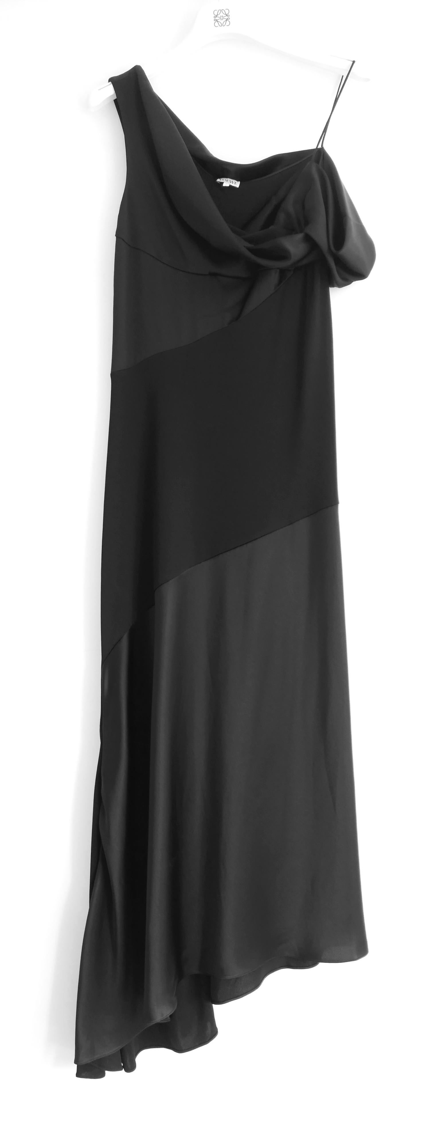 Modern slinky Loewe draped satin and crepe dress. Bought for £1750 and unworn.   Made from glossy black triacetate mix satin with and matte jersey crepe panelling. It has vintage inspired, bias cut draped cut with an asymmetric off the shoulder