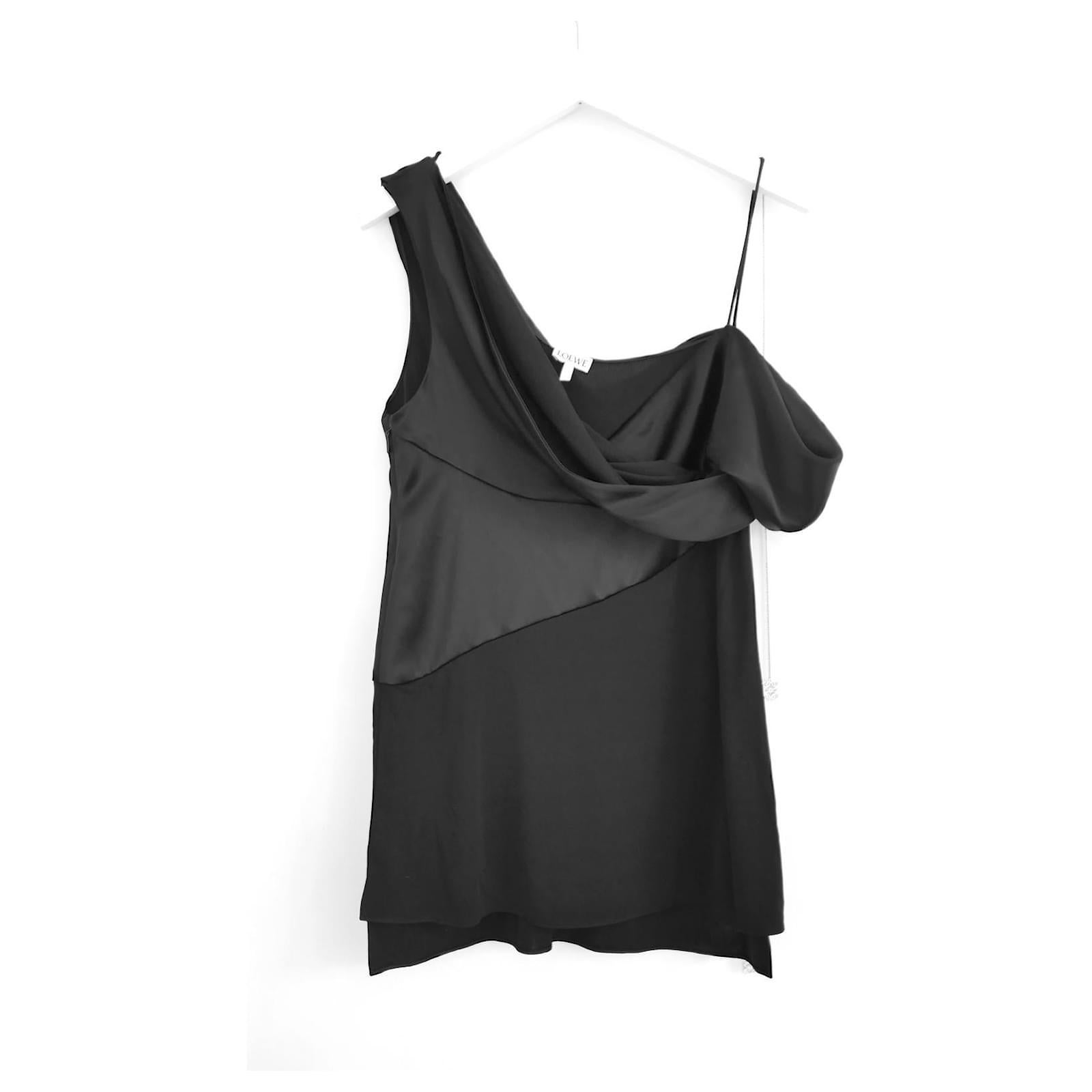 Modern drama Loewe draped satin and crepe top. bought for £1025 and new with tags. 
Made from glossy black triacetate mix satin with bias cut matte jersey crepe panel, it has an asymmetric off he should neckline with fine Anagram fob chain