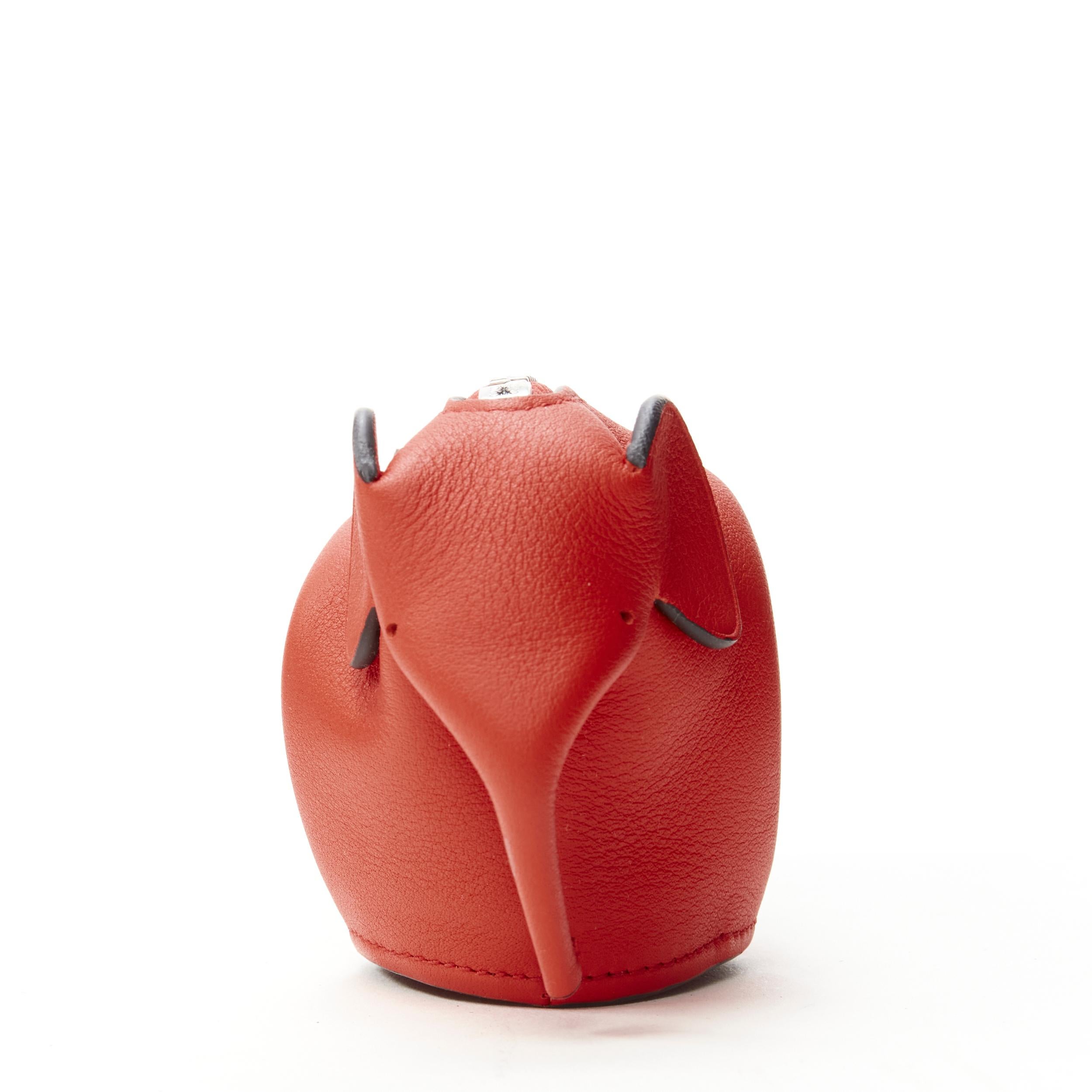 LOEWE Elephant red leather coins purse bag charm 
Reference: LNKO/A01999 
Brand: Loewe 
Designer: JW ANderson 
Material: Leather 
Color: Red 
Pattern: Solid 
Closure: Zip 
Extra Detail: Silver-tone top zip. Lobster clasp. 


CONDITION: 
Condition: