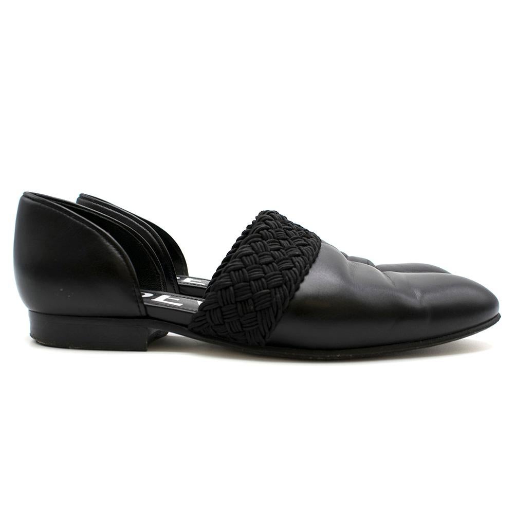 Loewe Flex D'Orsay Braided Leather Loafers

-Black calf loafer with Woven Fabric 
-Leather lining 
-Fabric Trim 
-Leather insole and white  sole
-Round toe
-Cut out detailing 

Please note, these items are pre-owned and may show some signs of