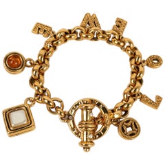 Vintage Loewe Golden Metal Bracelet with Charms
